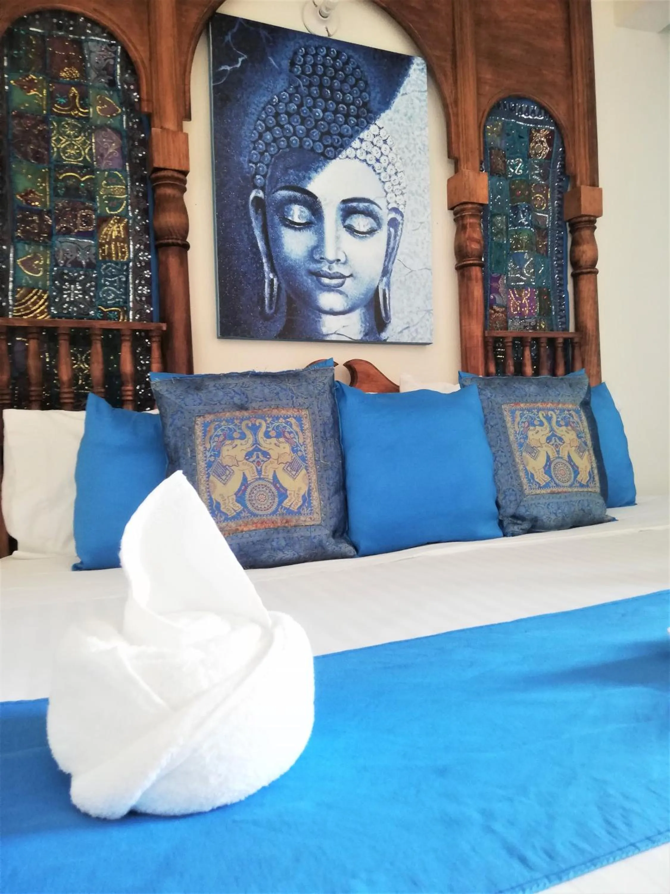 Bed in Ganesha Hotel