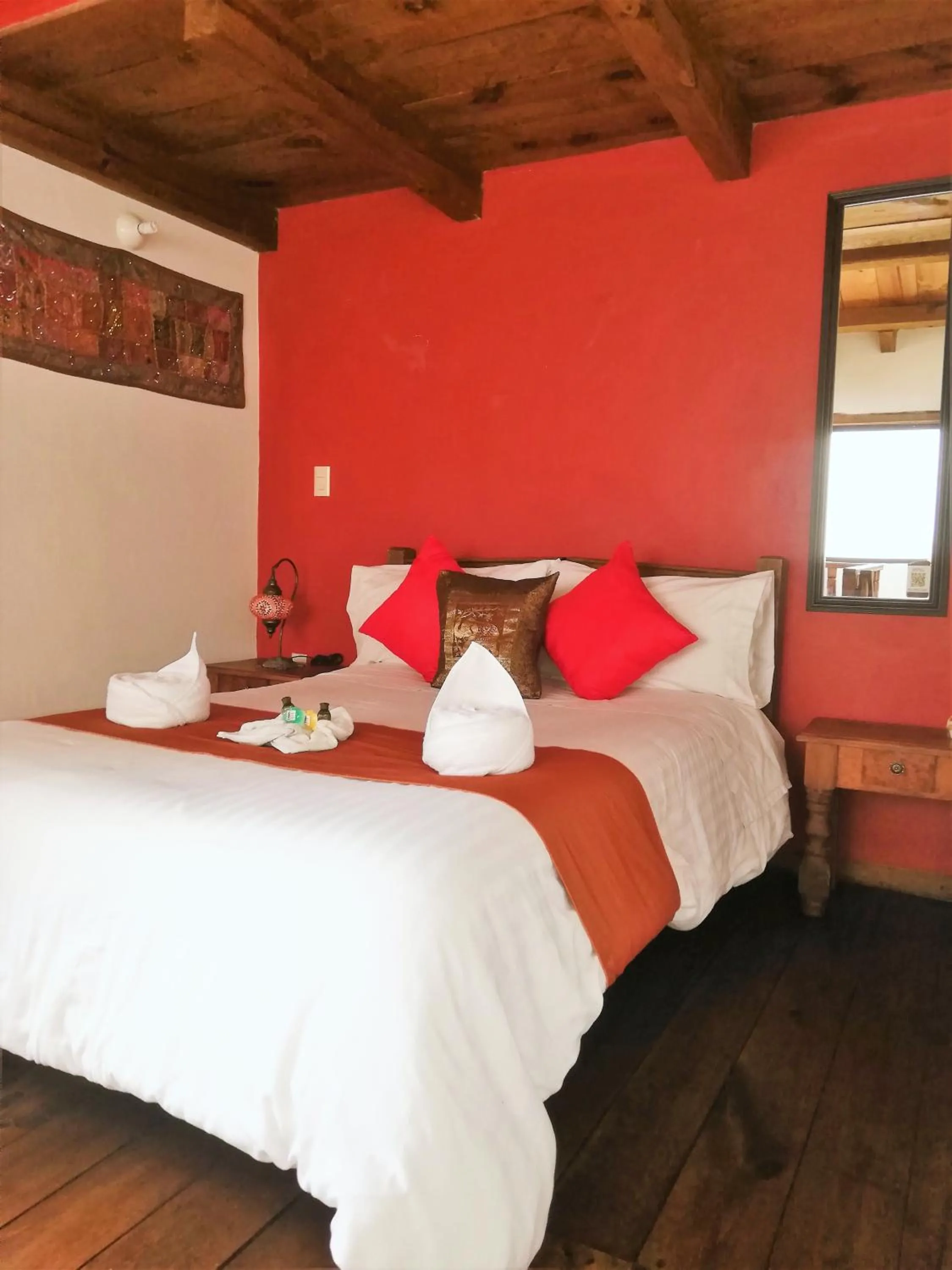 Bed in Ganesha Hotel