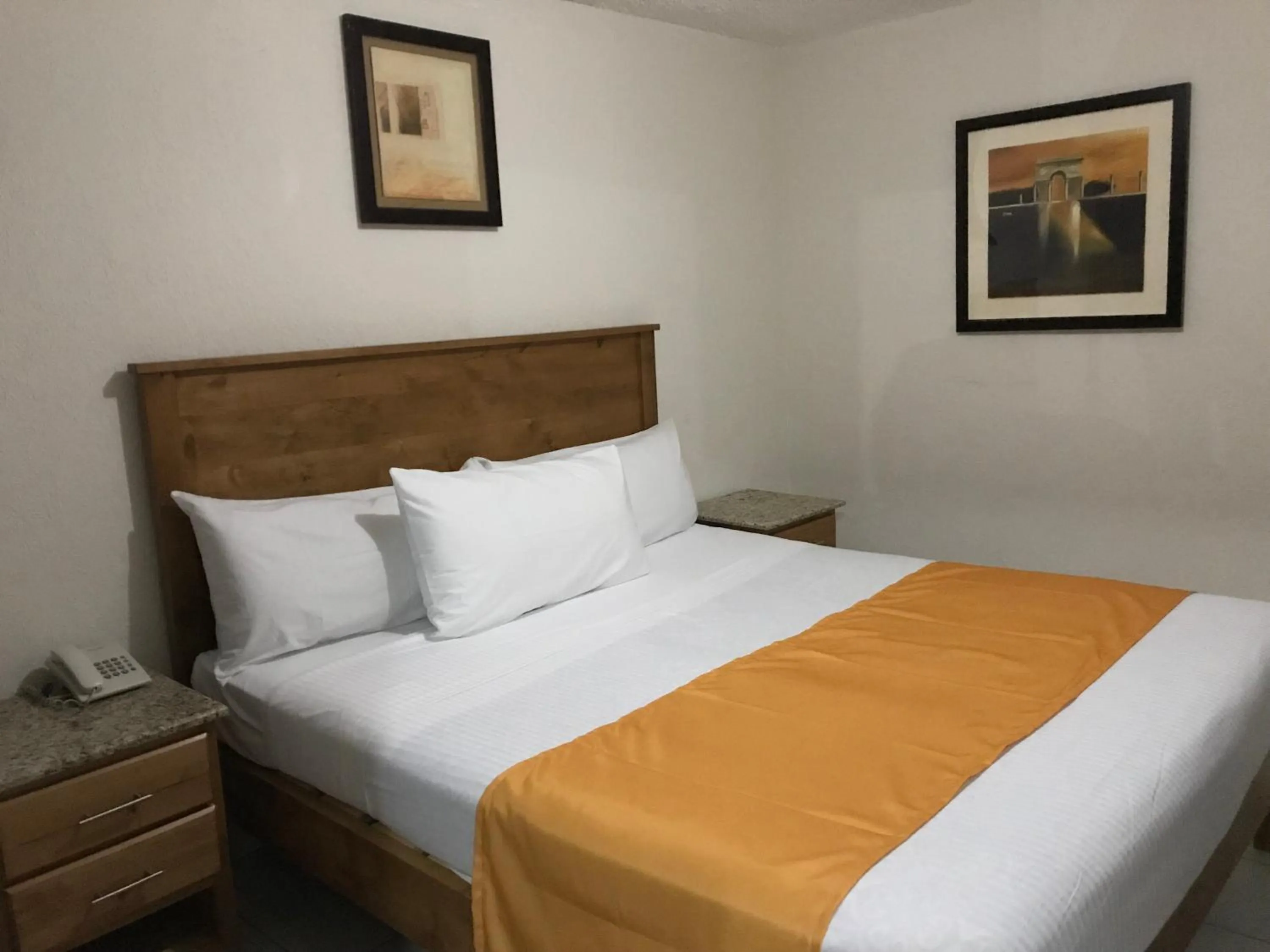 Bed in Hotel Guillen Jr