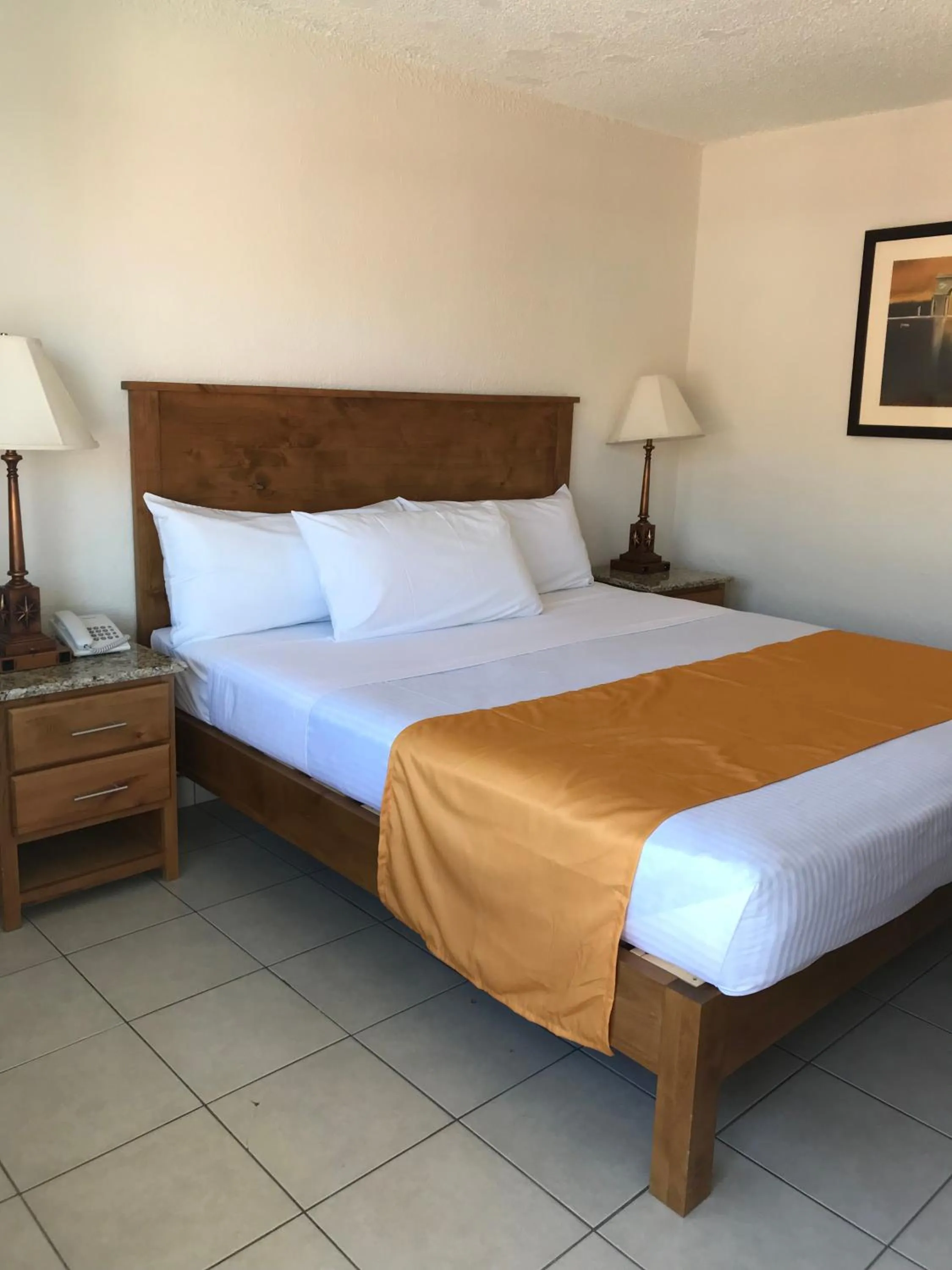 Bed in Hotel Guillen Jr