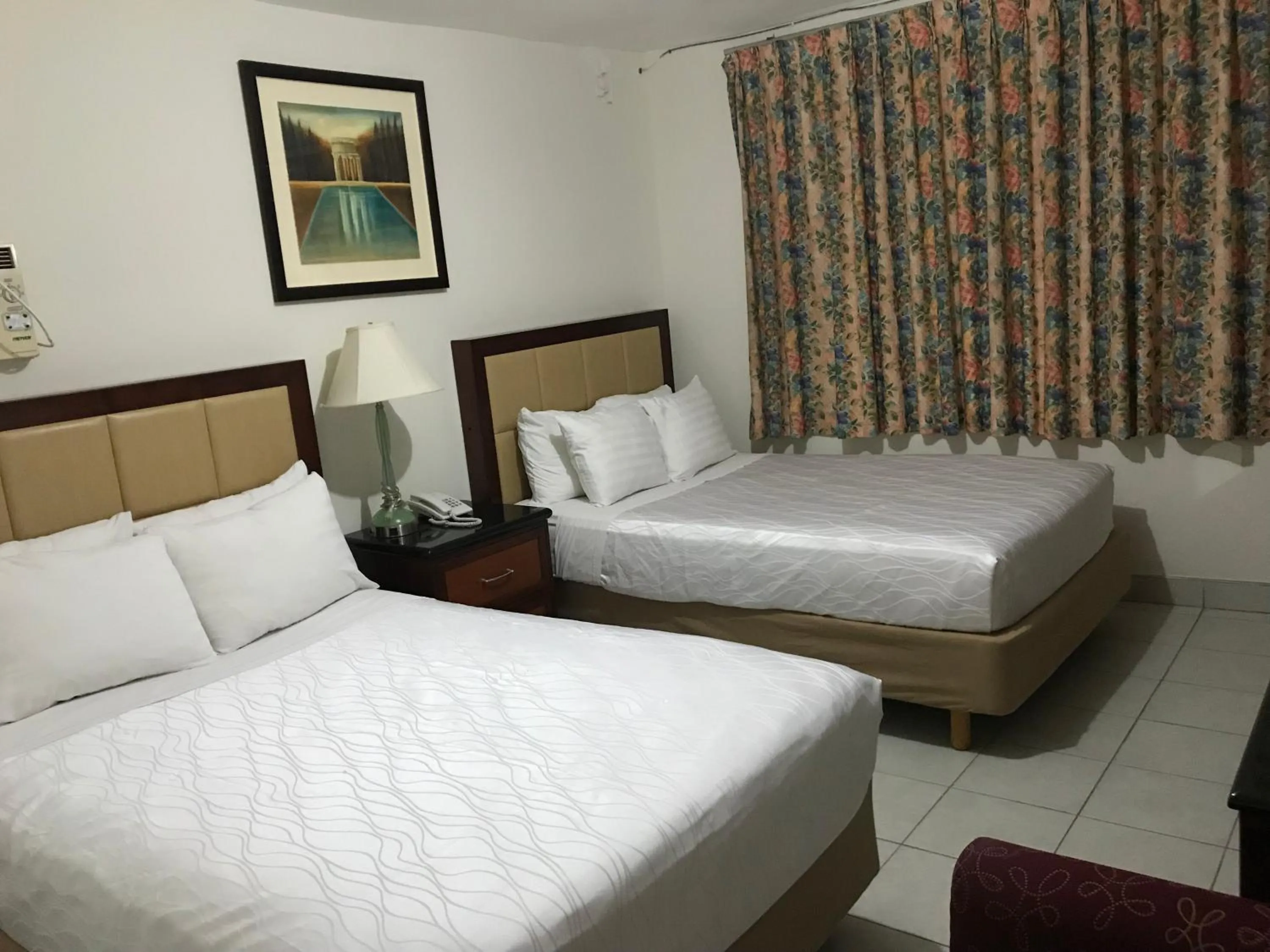 Bed in Hotel Guillen Jr