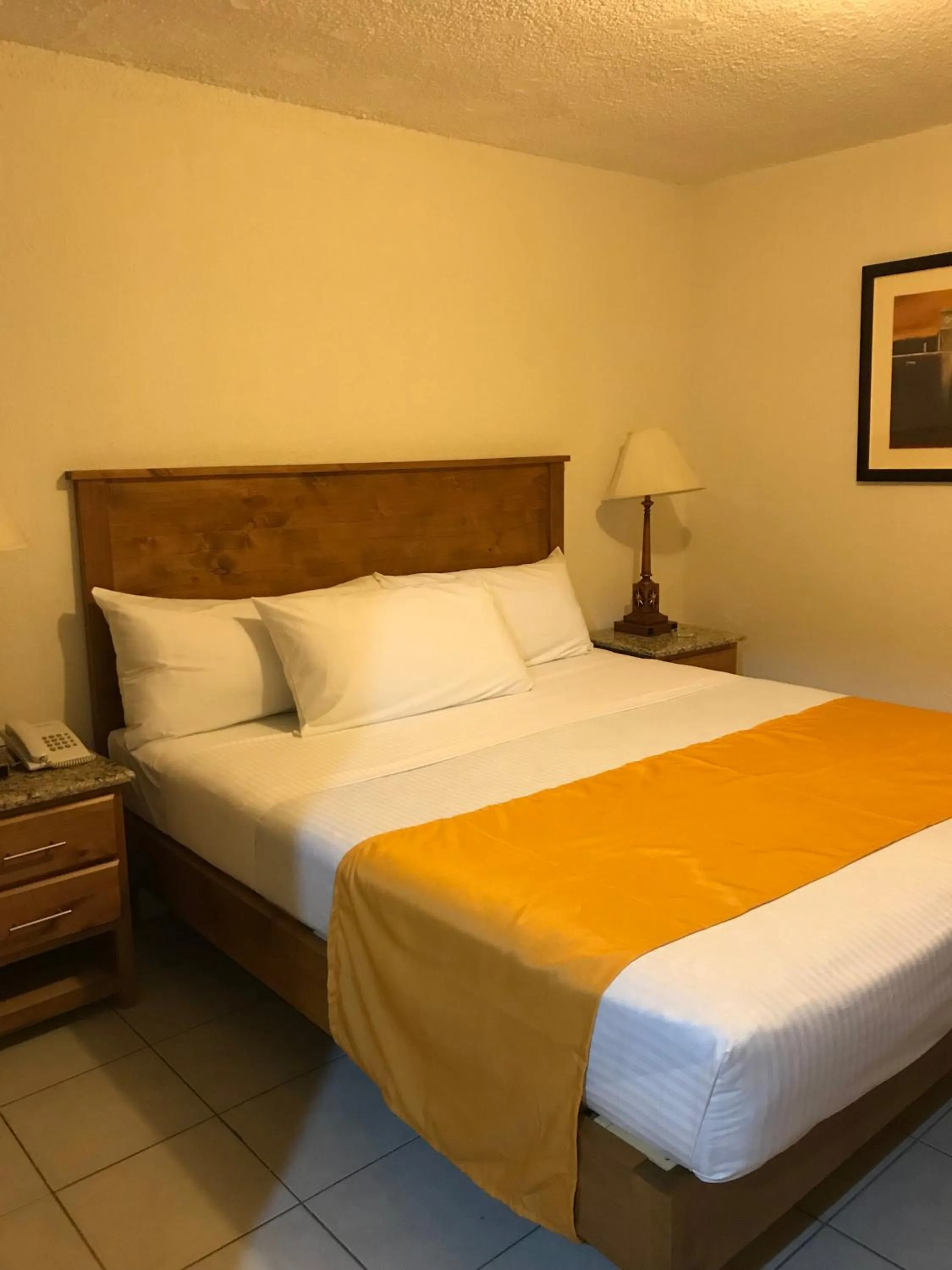 Bed in Hotel Guillen Jr