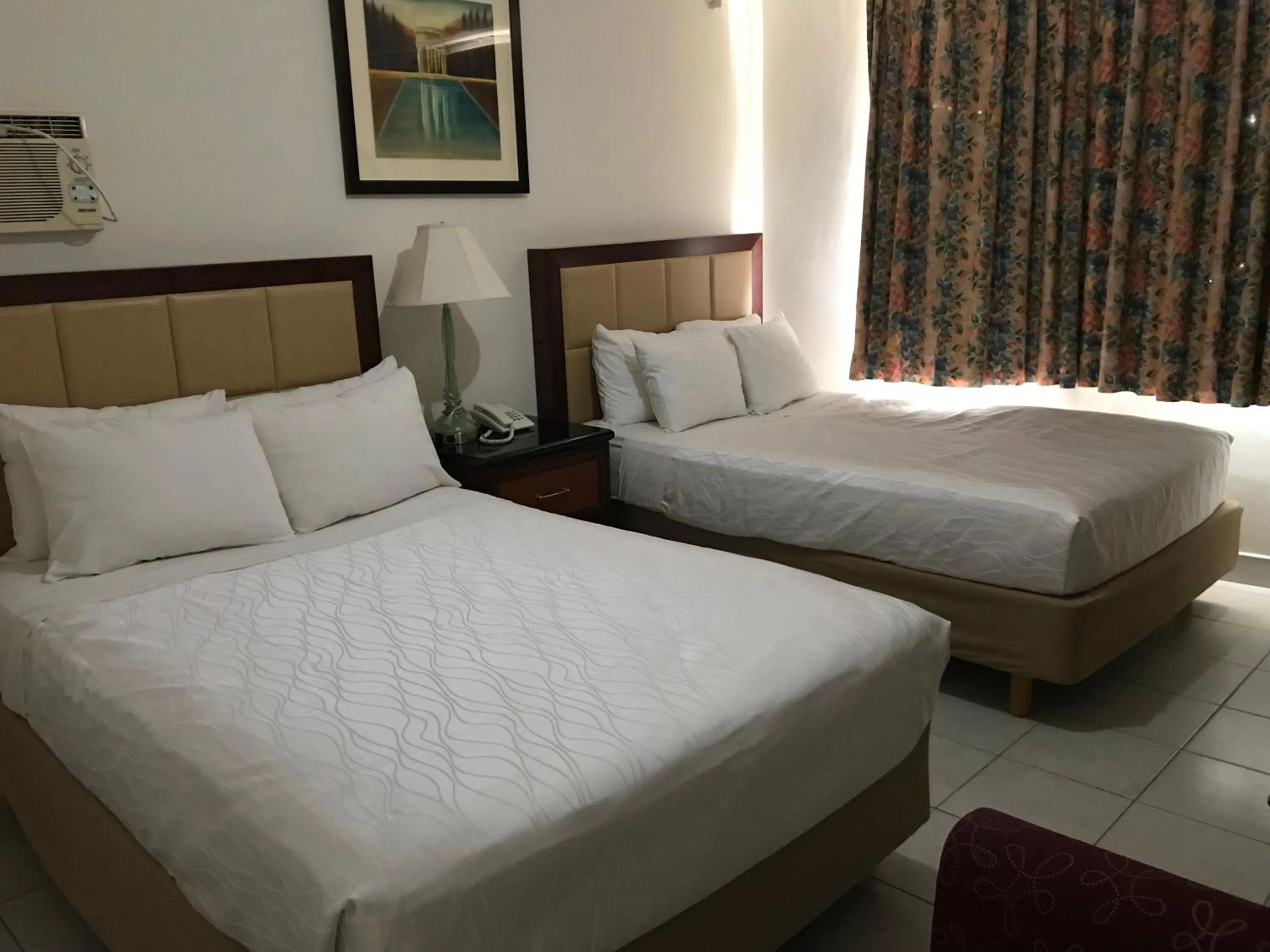 Bed in Hotel Guillen Jr