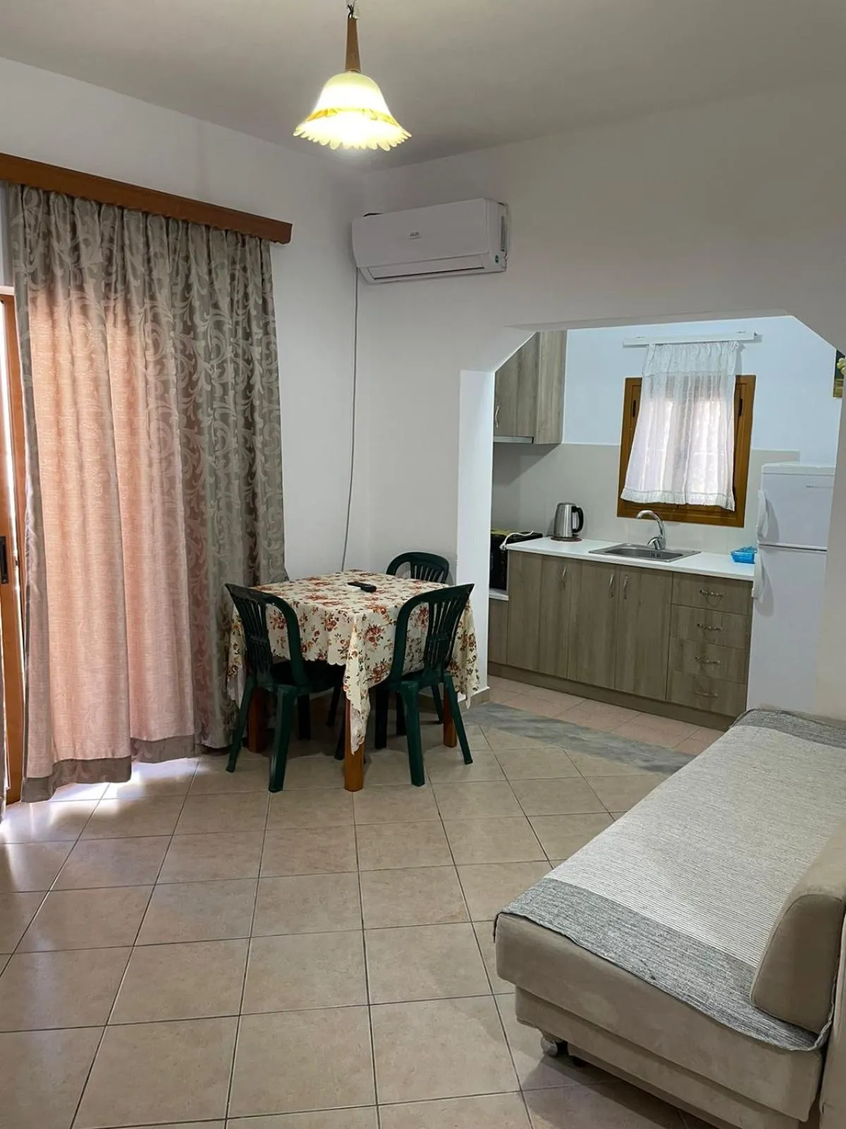 Family Room with Balcony in Olive Tree