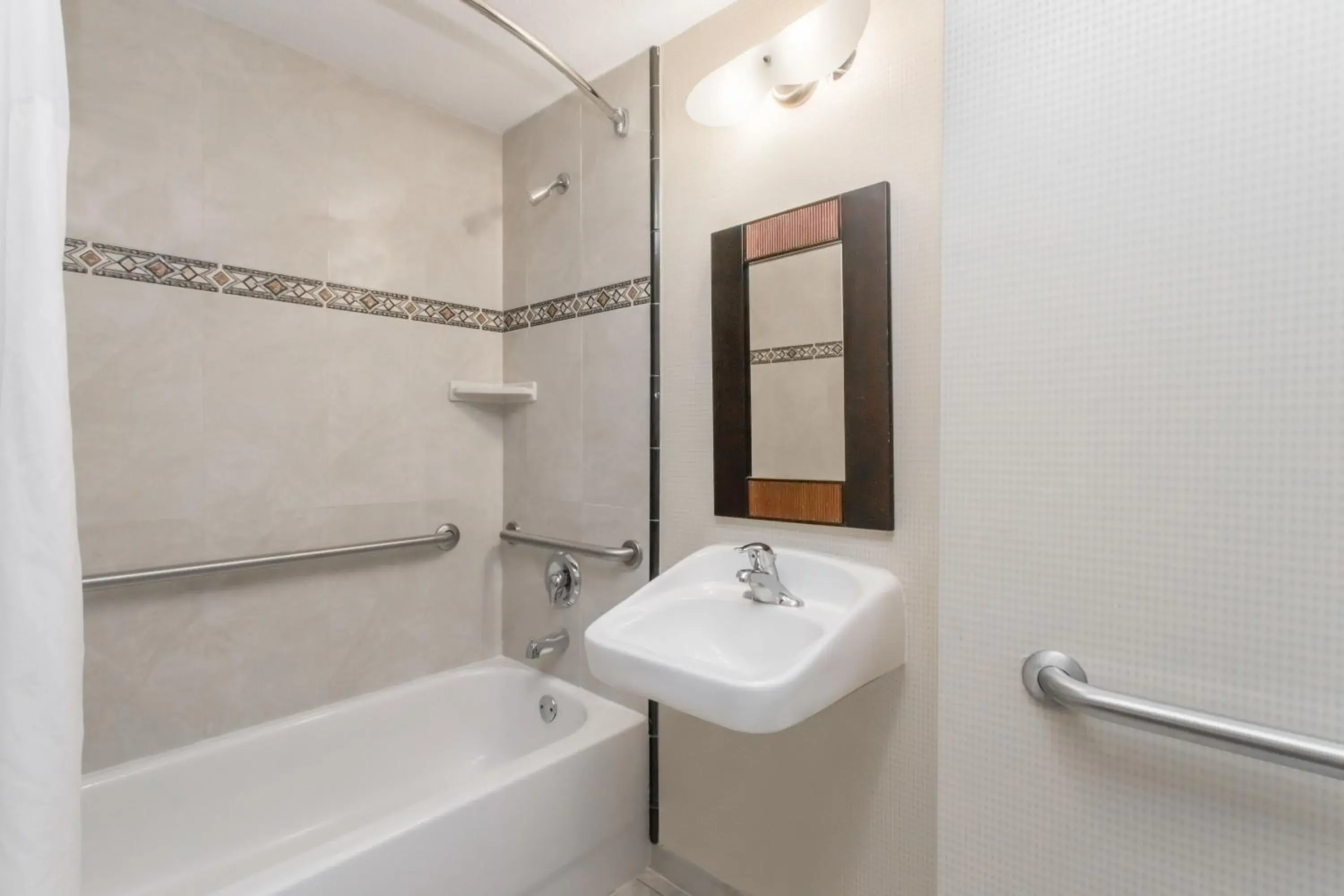 Queen Room with Two Queen Beds and Roll-In Shower - Mobility/Hearing Accessible - Non-Smoking in Days Inn & Suites by Wyndham Fort Pierce I-95 Queen Room with Two Queen Beds and Roll-In Shower - Mobility/Hearing Accessible - Non-Smoking in Days Inn & Suites by Wyndham Fort Pierce I-95