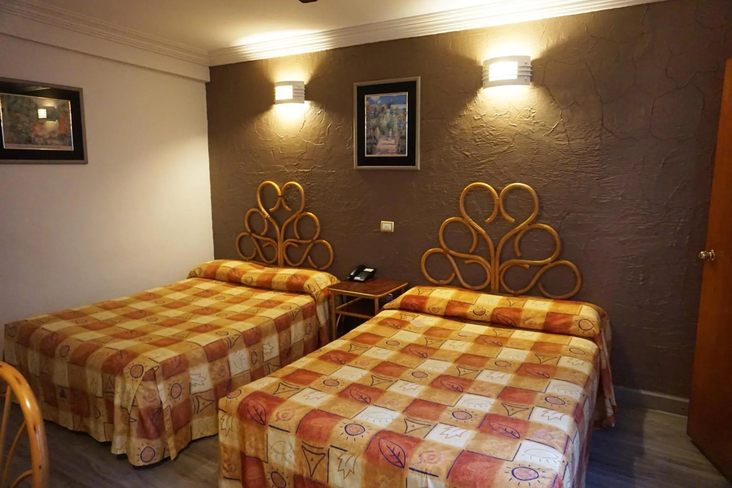 Bed in Hotel Plaza Crystal