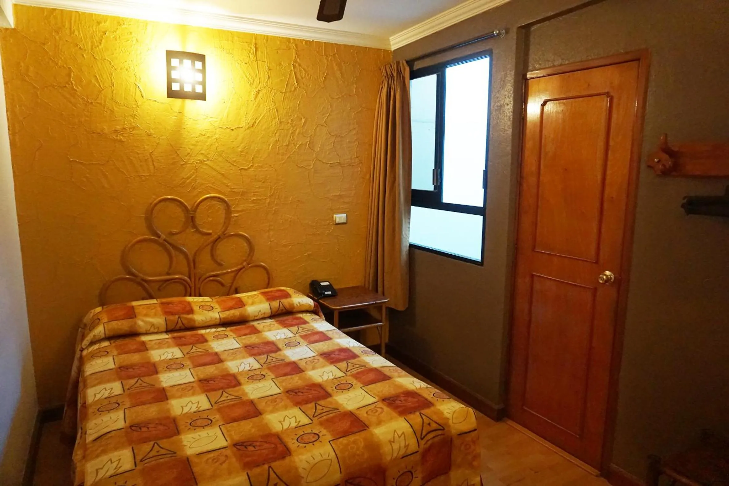 Bed in Hotel Plaza Crystal