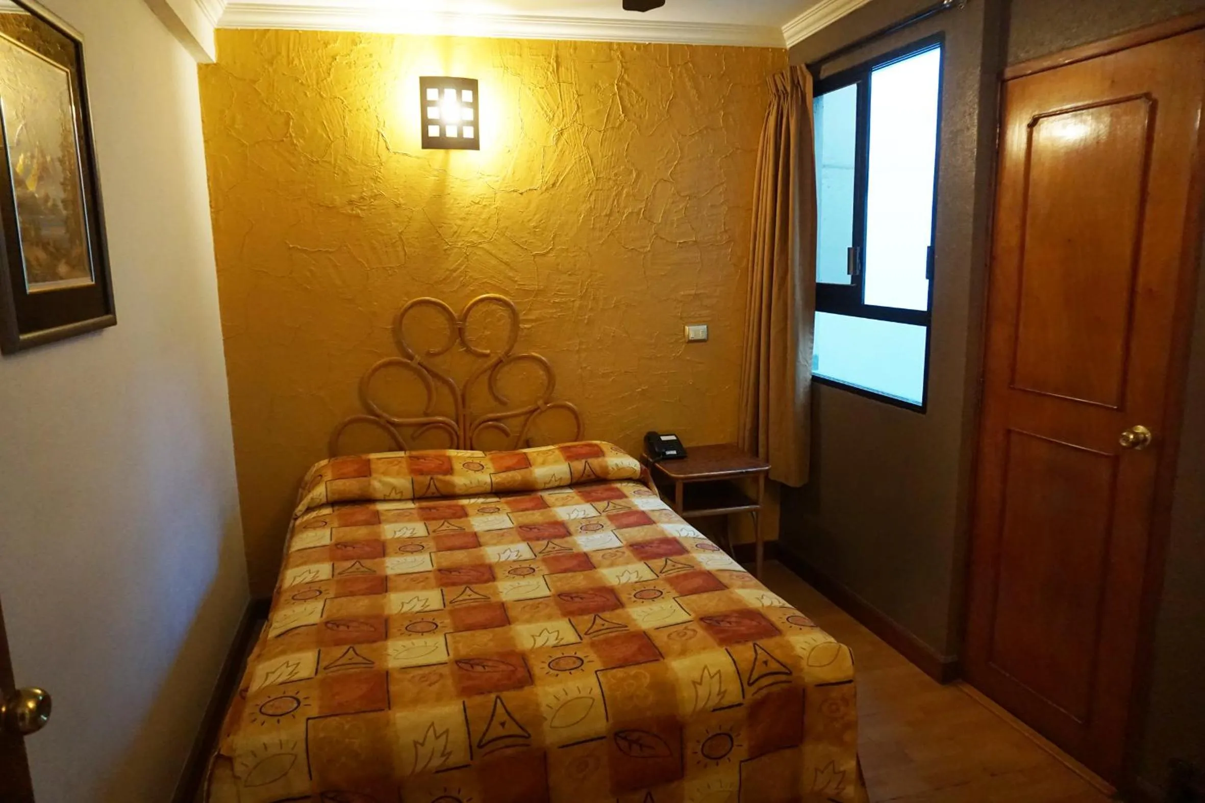 Bed in Hotel Plaza Crystal
