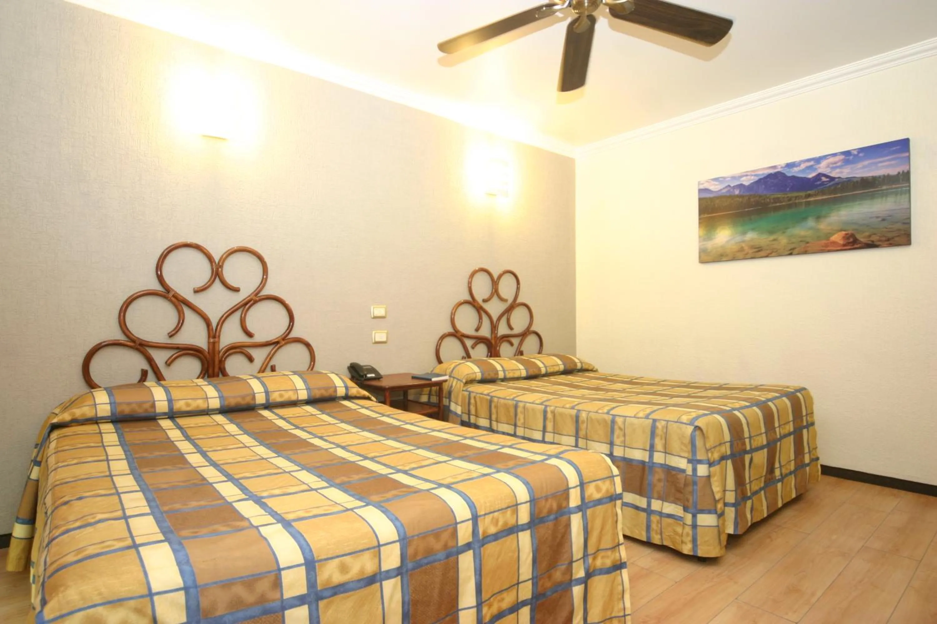 Bed in Hotel Plaza Crystal