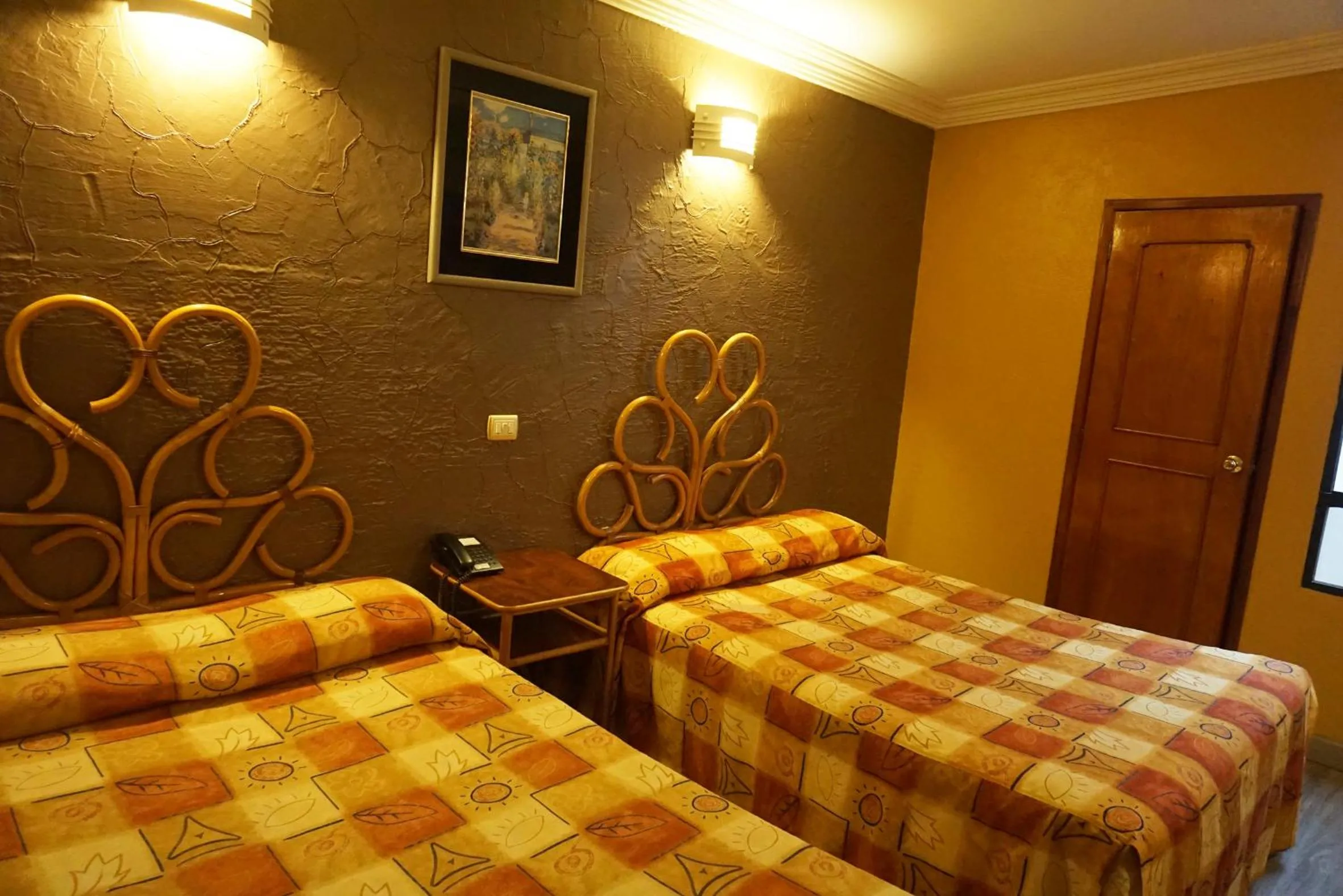 Bed in Hotel Plaza Crystal