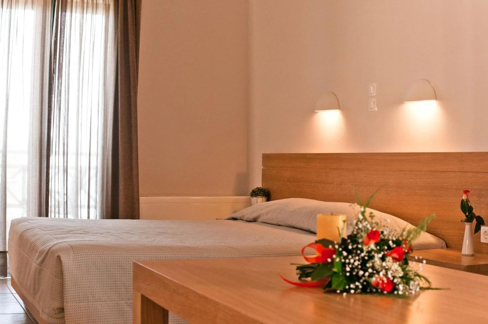 Bed in Silver Beach Hotel & Apartments