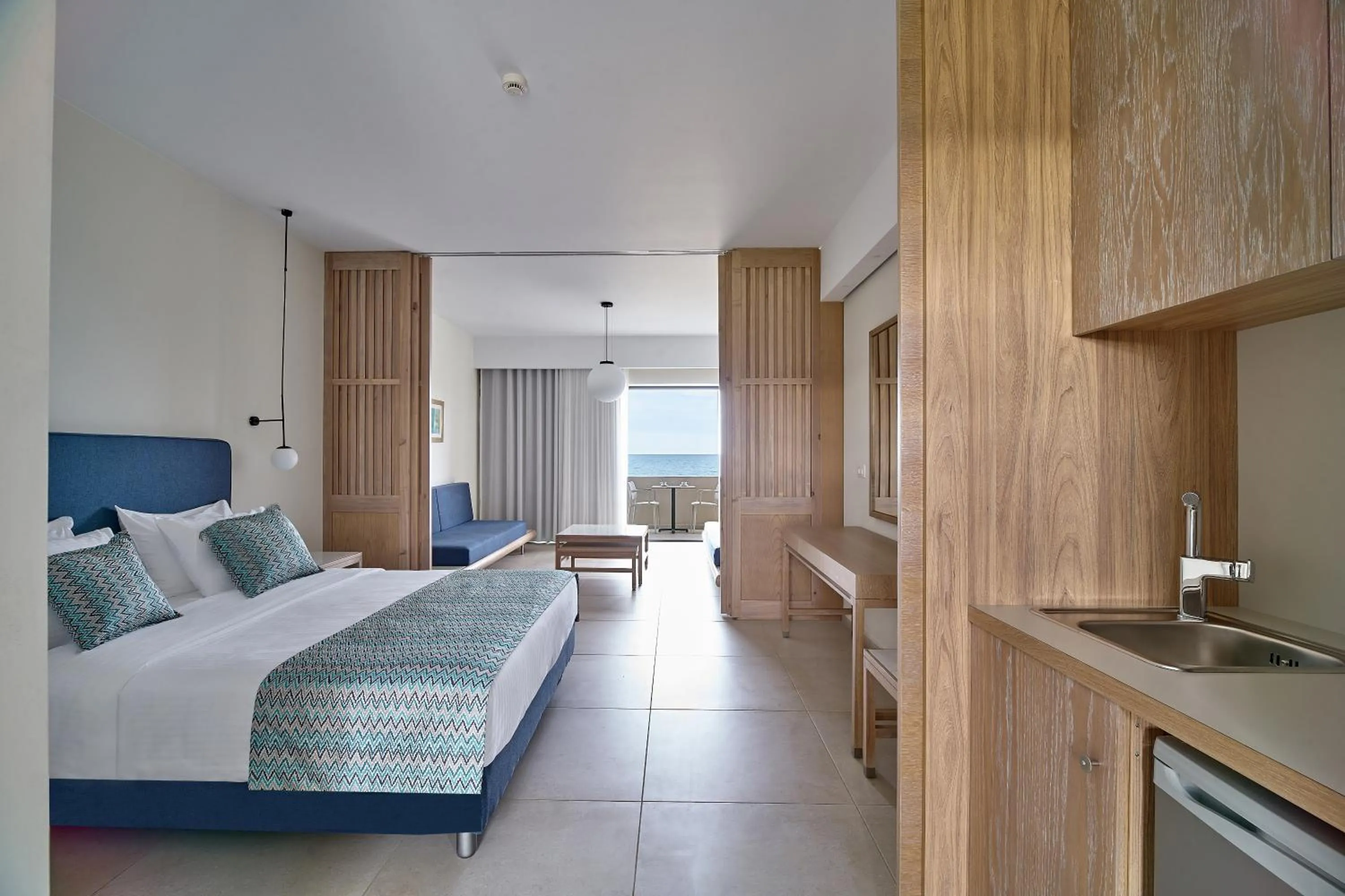 Bed in Silver Beach Hotel & Apartments