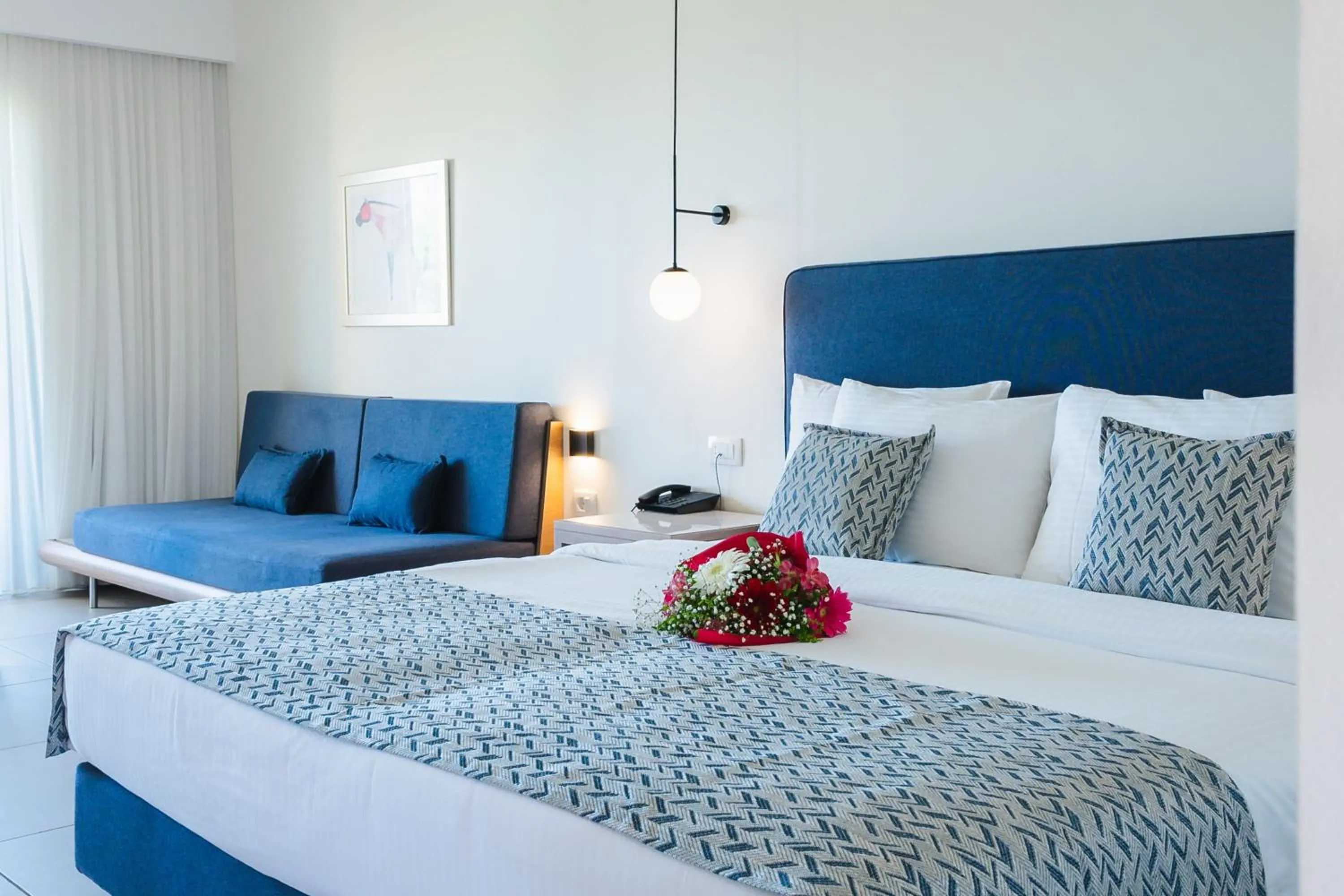 Bed in Silver Beach Hotel & Apartments