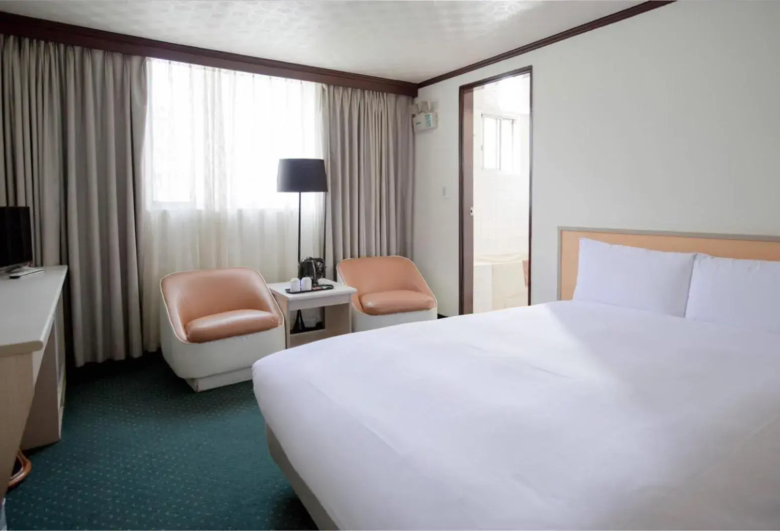 Bed in Tien Chin Hotel