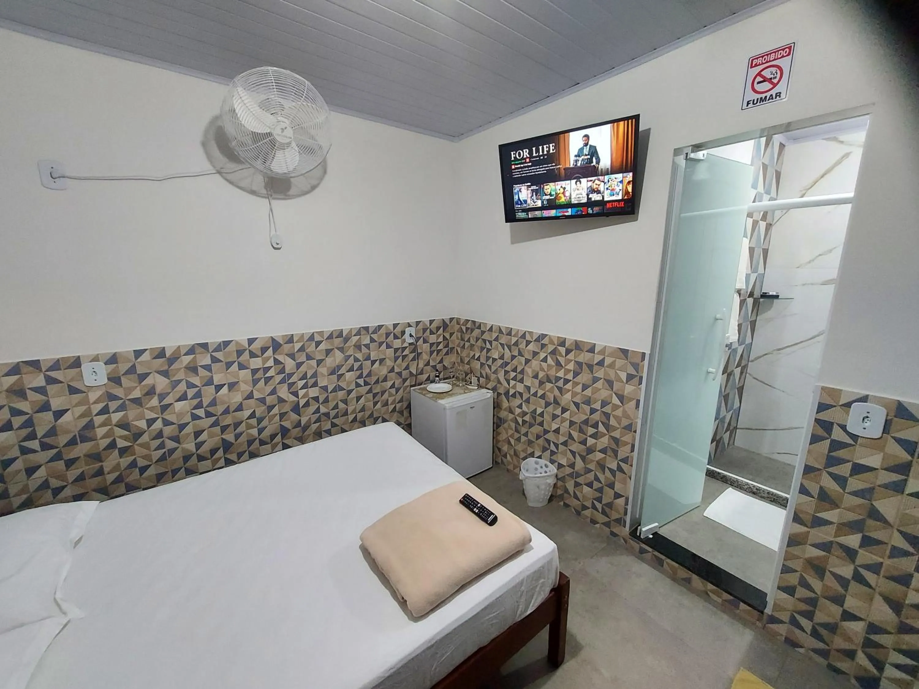Bed in Pousada do Leô