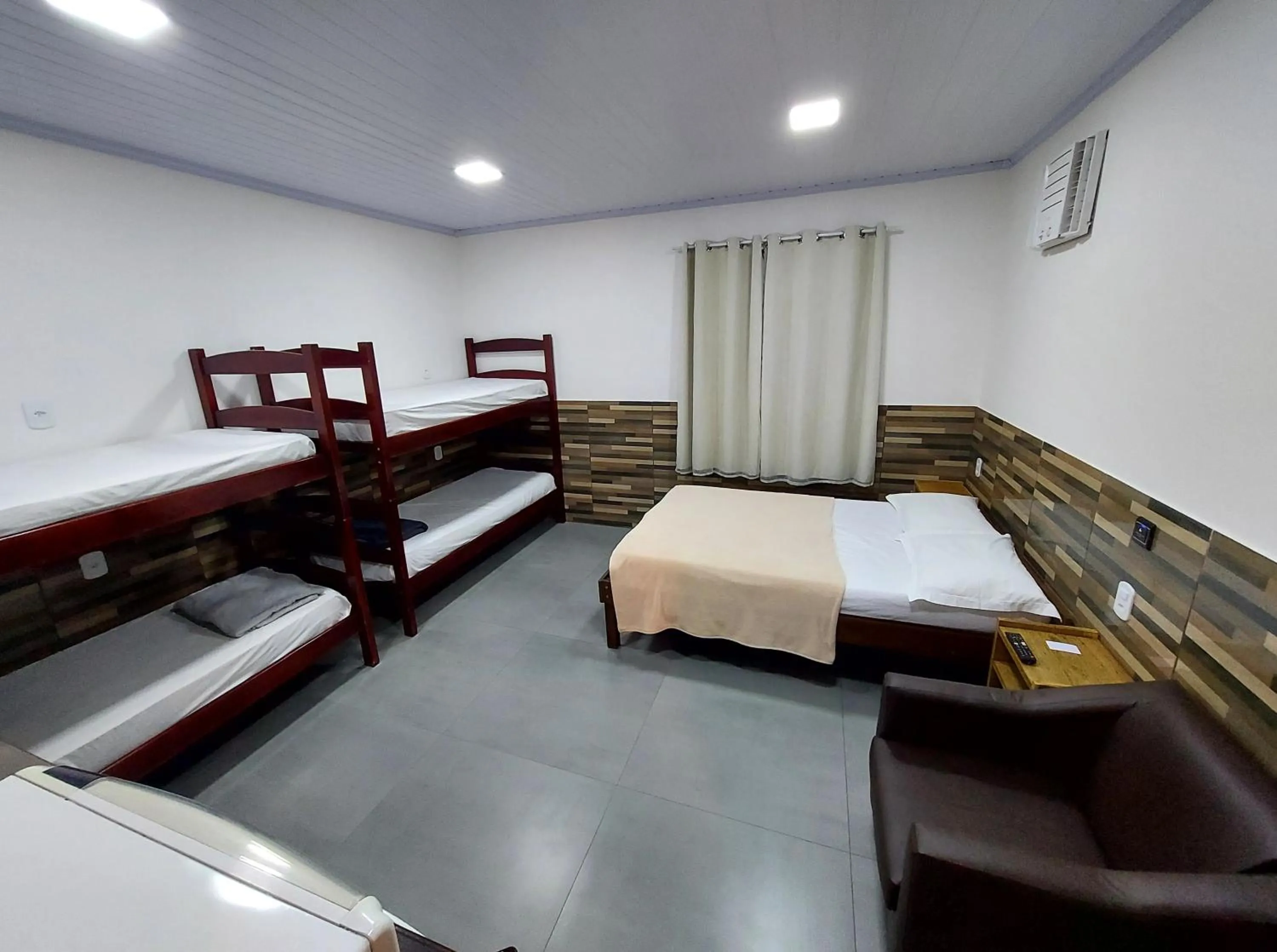 Bed in Pousada do Leô