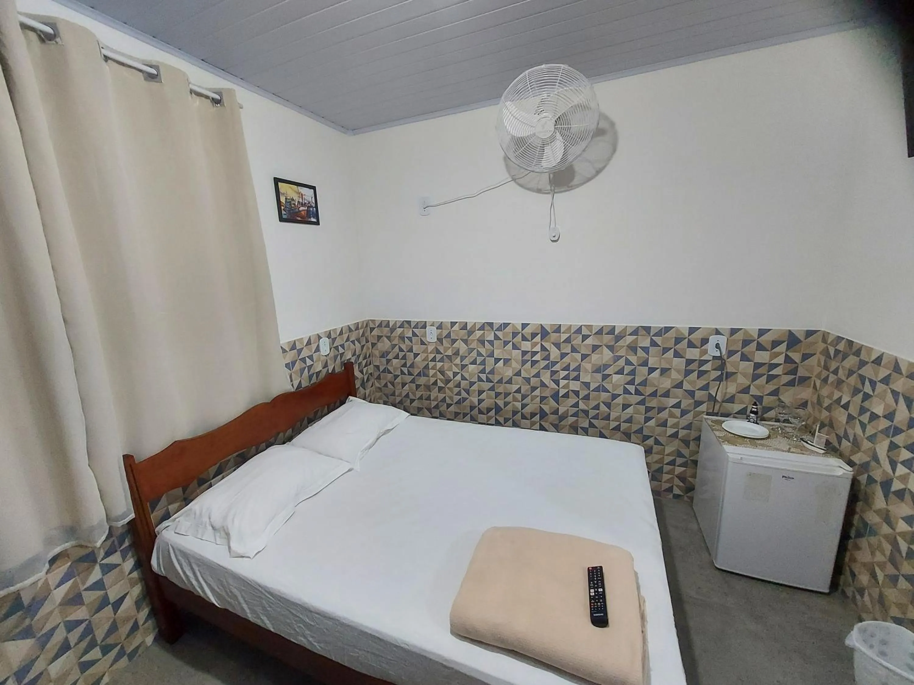 Bed in Pousada do Leô
