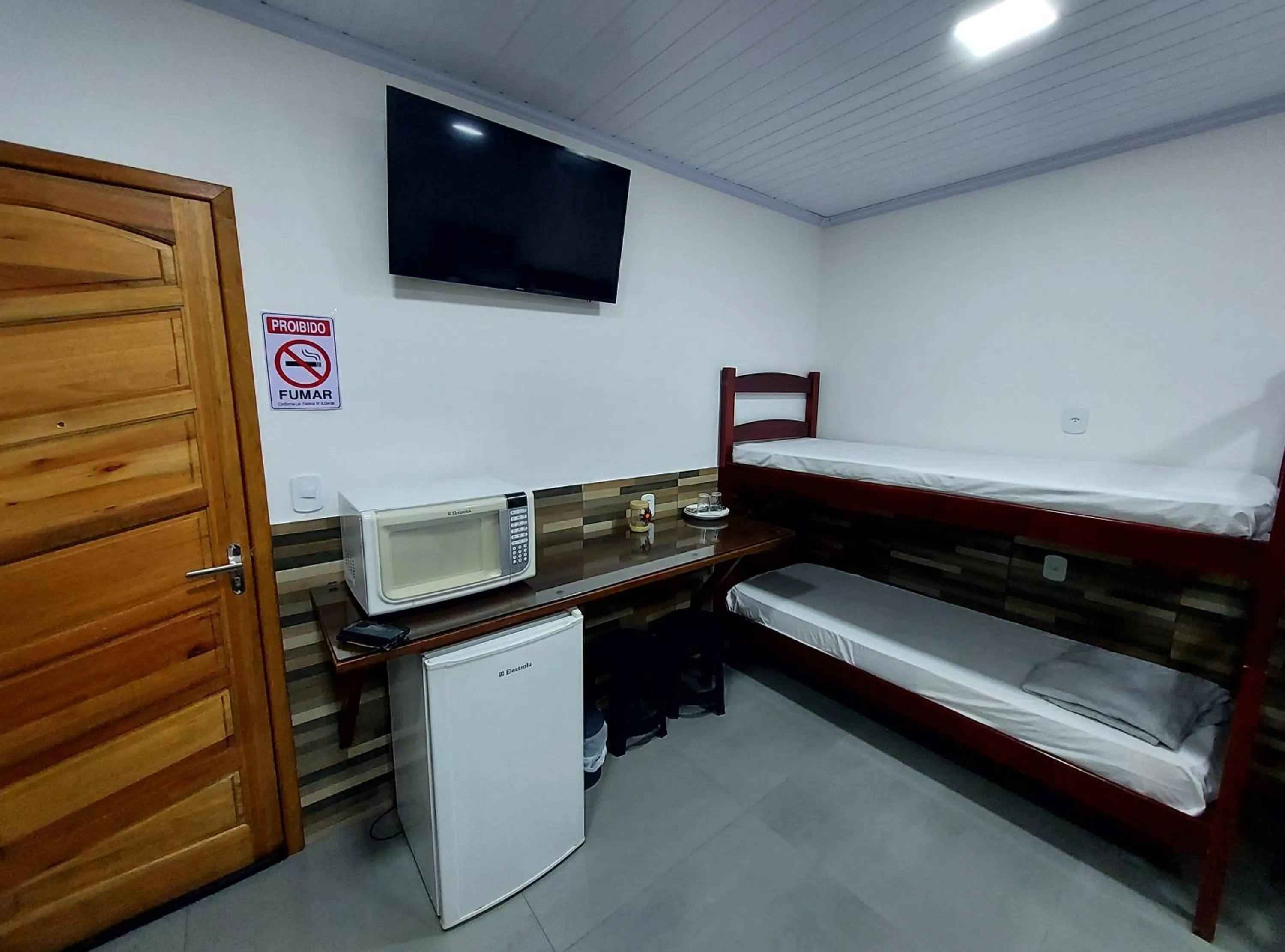 Bed in Pousada do Leô