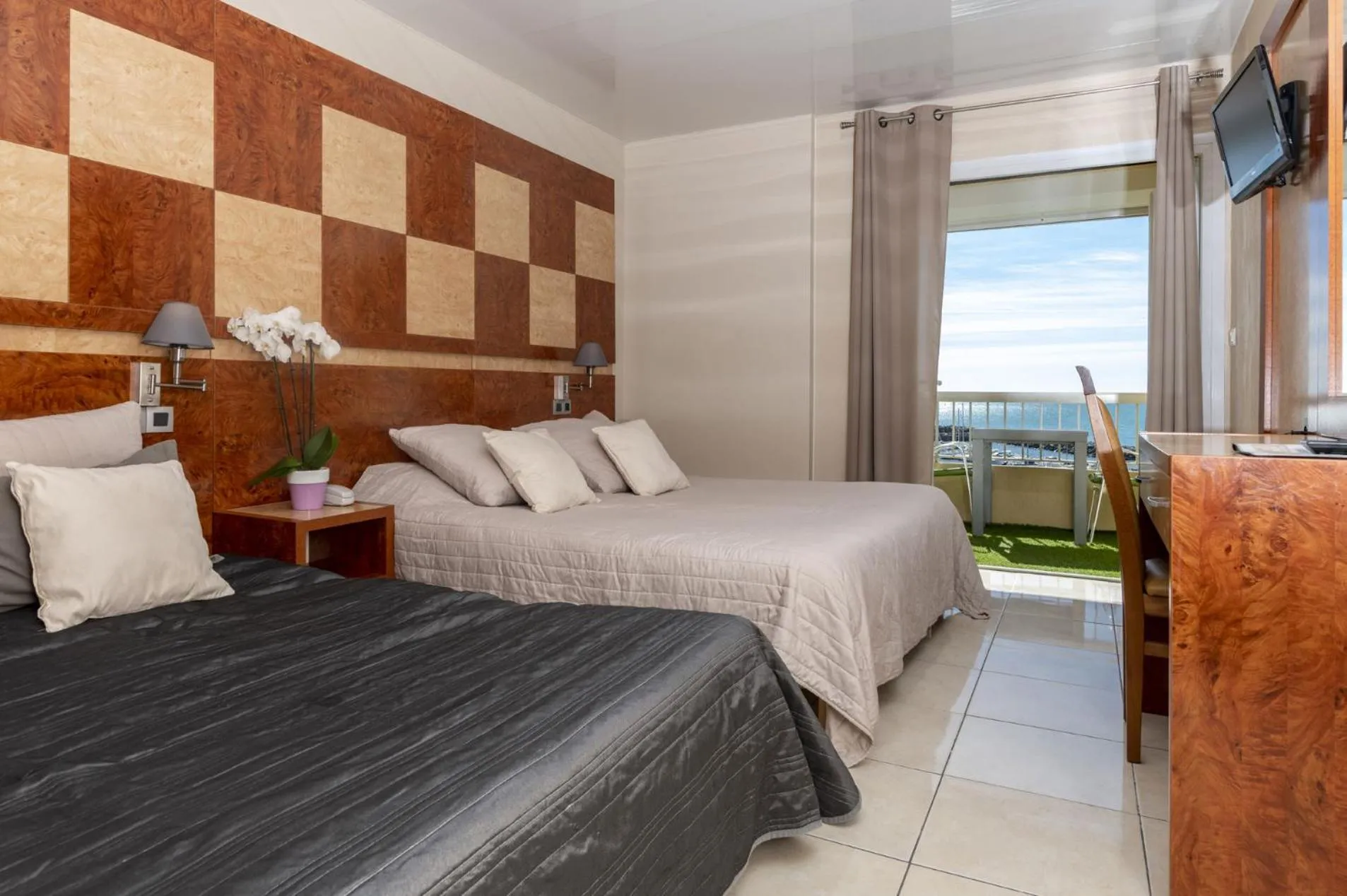 Quadruple Room in Hotel Le Richmont