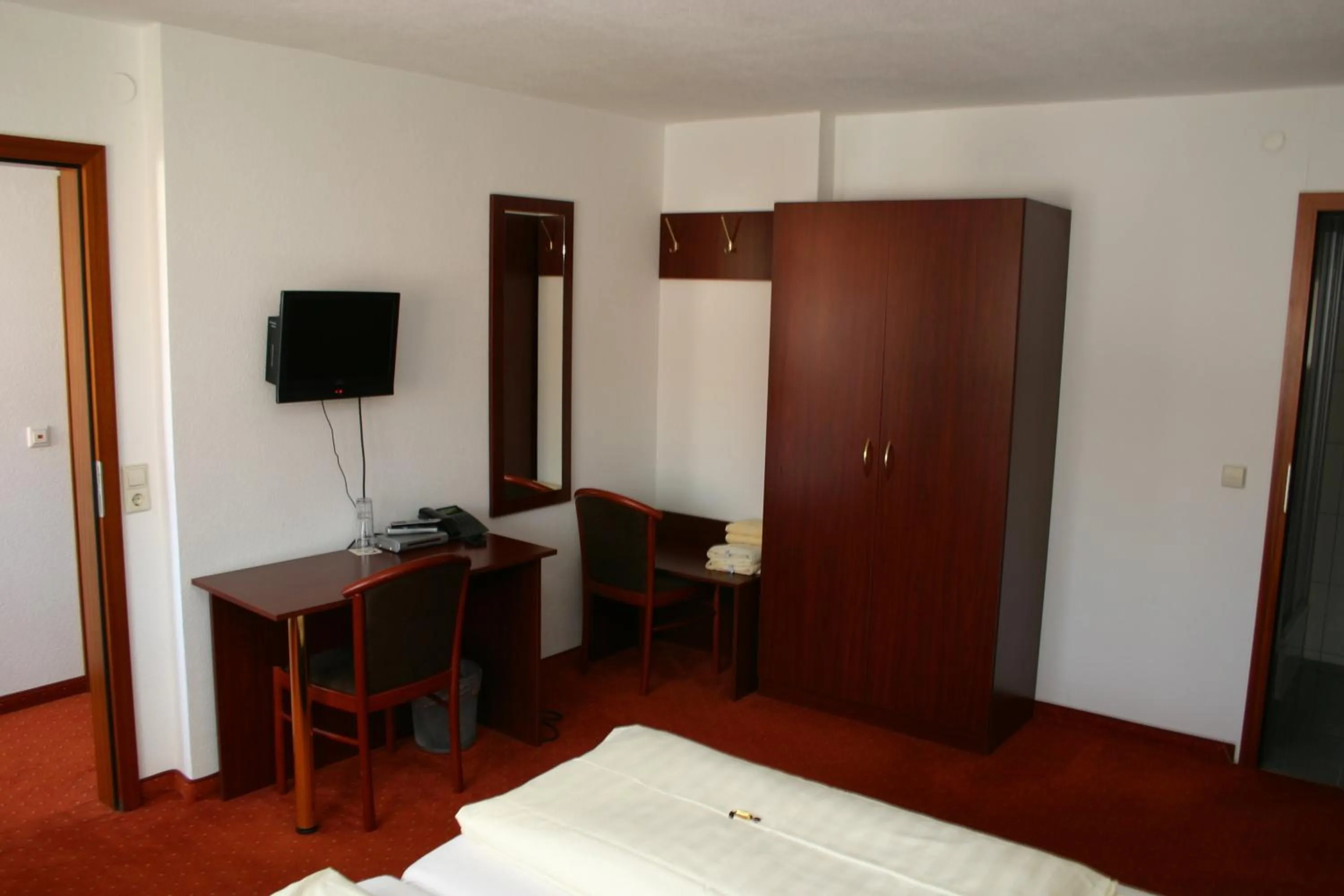 Photo of the whole room, Bed in Gasthaus Traube