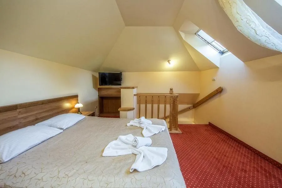 Bed in Hotel Pod Gołębiem