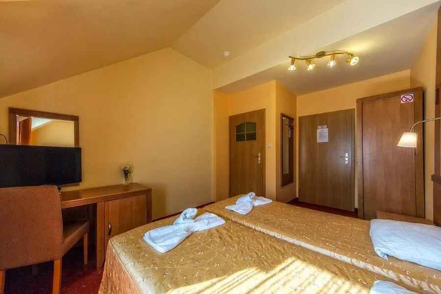Bed in Hotel Pod Gołębiem