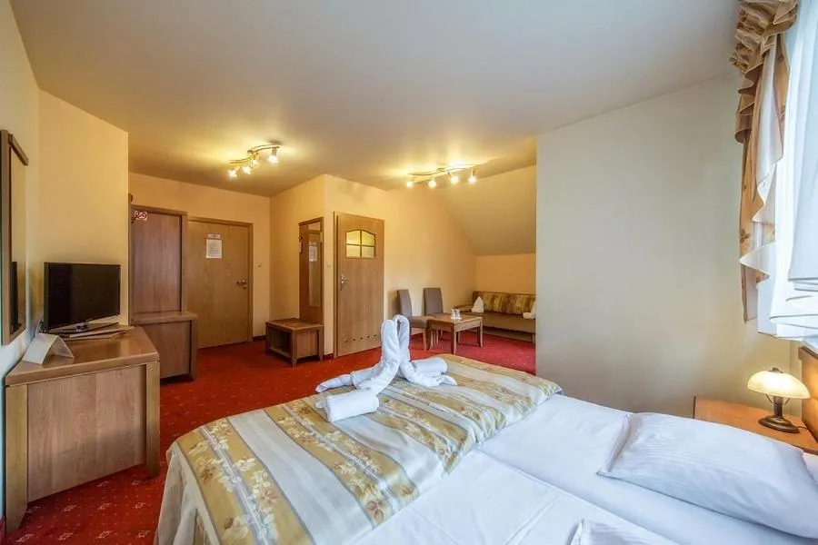 Bed in Hotel Pod Gołębiem