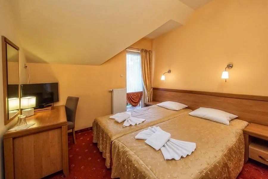 Bed in Hotel Pod Gołębiem