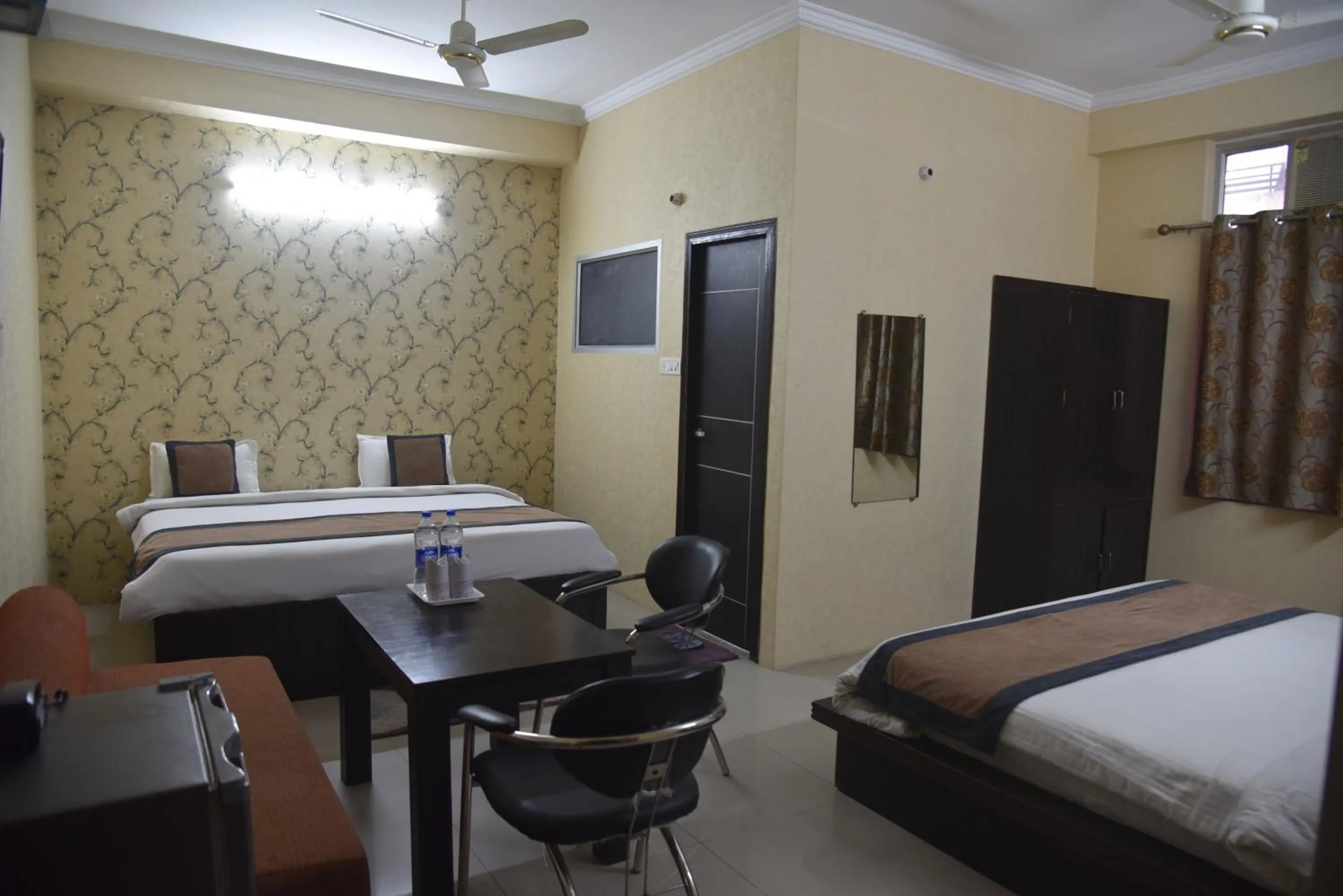 Bed in Hotel Nexus l Hotels In Charbagh Lucknow