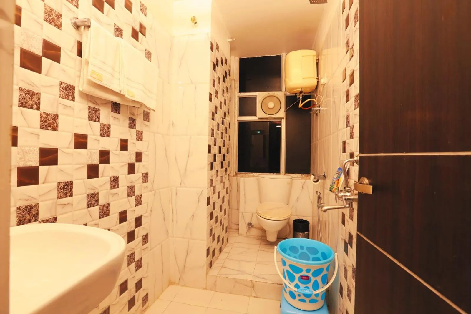 Bathroom in Hotel Nexus l Hotels In Charbagh Lucknow