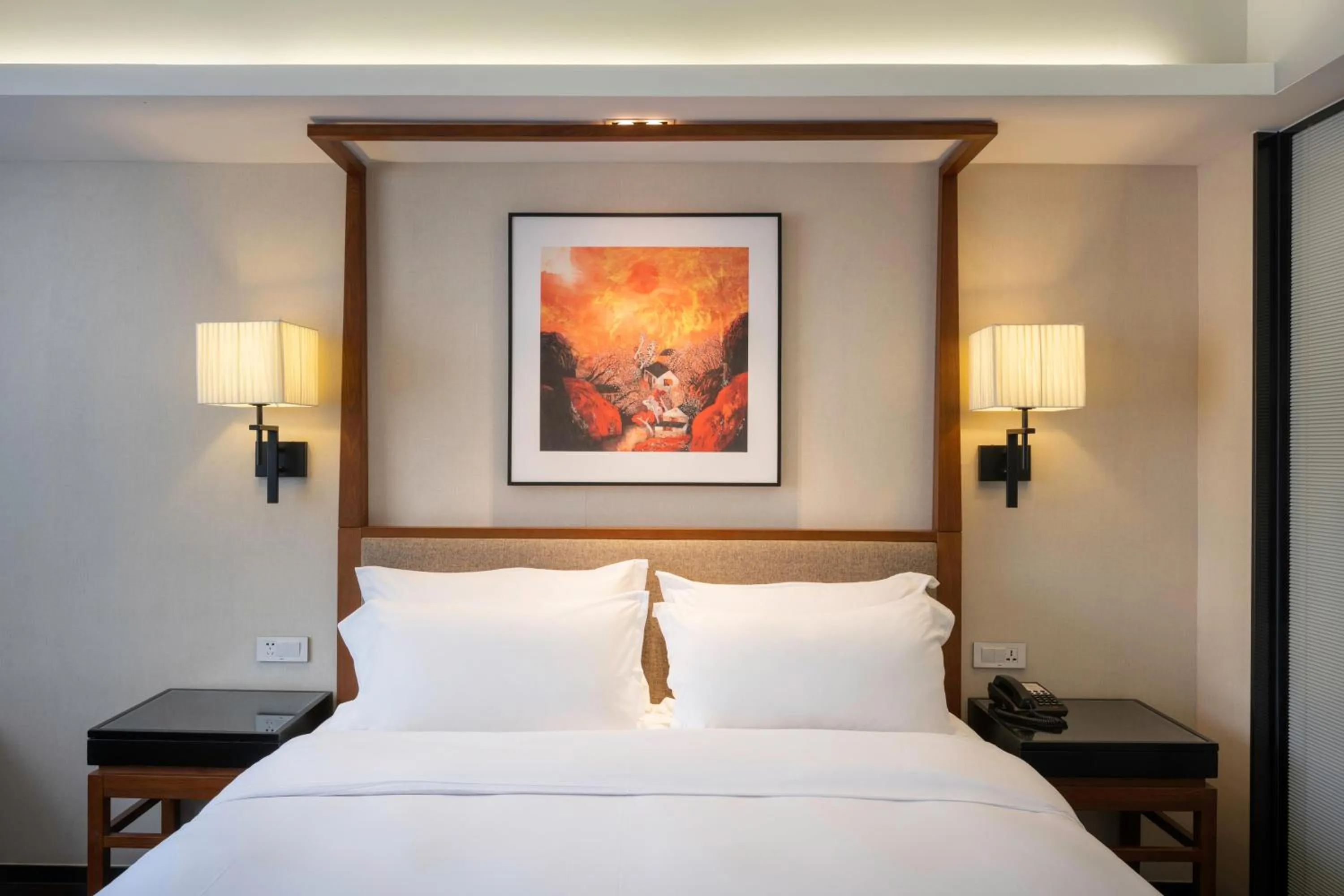 Bed in SSAW Boutique Hotel Sanya