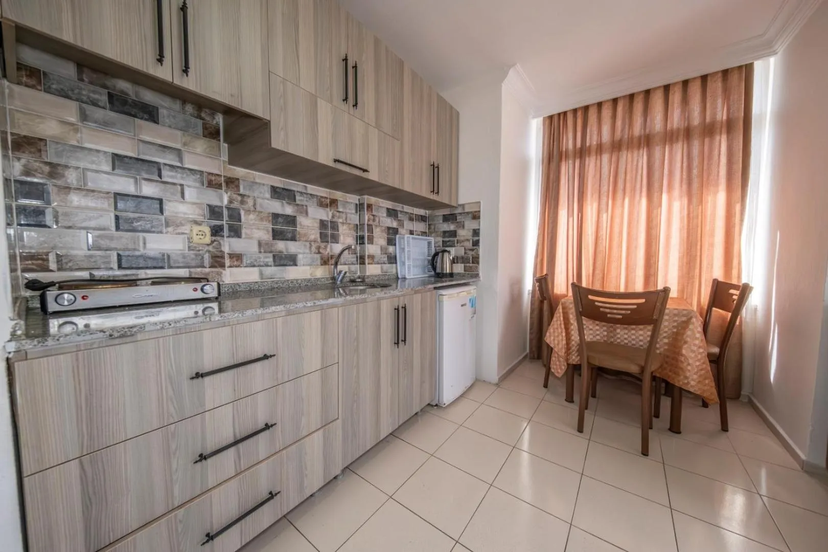 Kitchen or kitchenette in Marina Apart Hotel