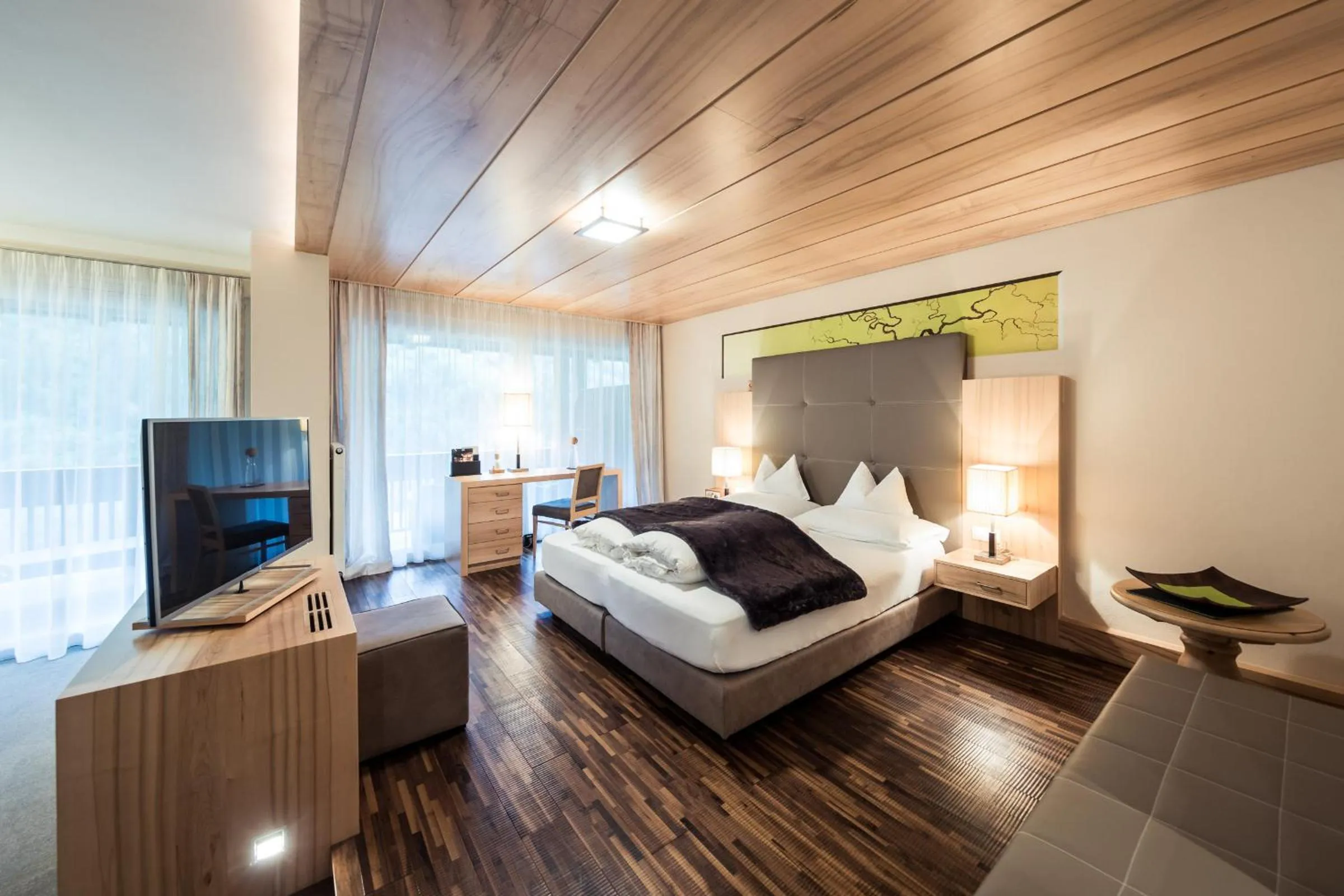 Photo of the whole room, Bed in Quellenhof Luxury Resort Passeier