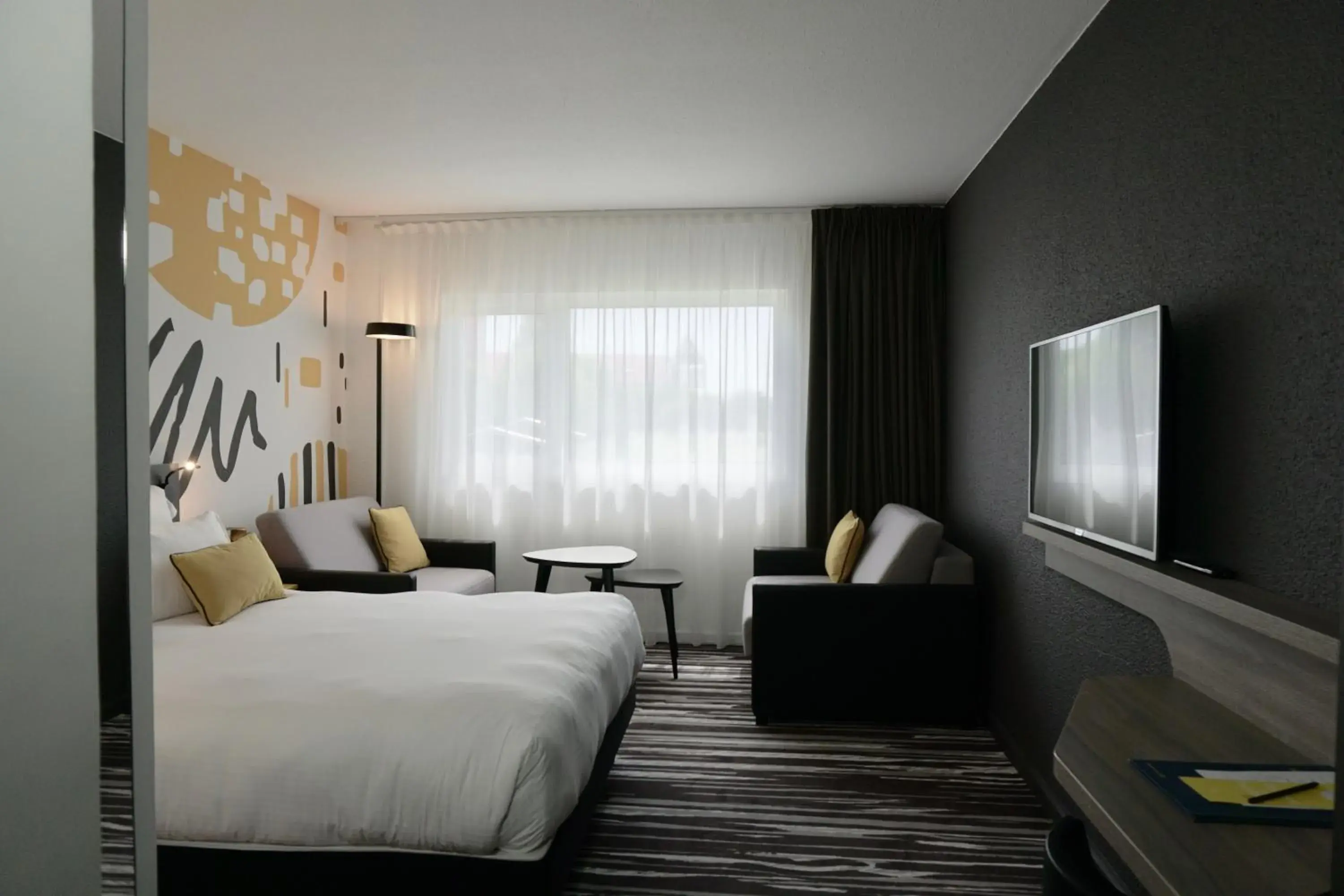 Superior Room With 1 Double Bed And 2 Sofa Beds in Golden Tulip Roissy Saint Witz Superior Room With 1 Double Bed And 2 Sofa Beds in Golden Tulip Roissy Saint Witz