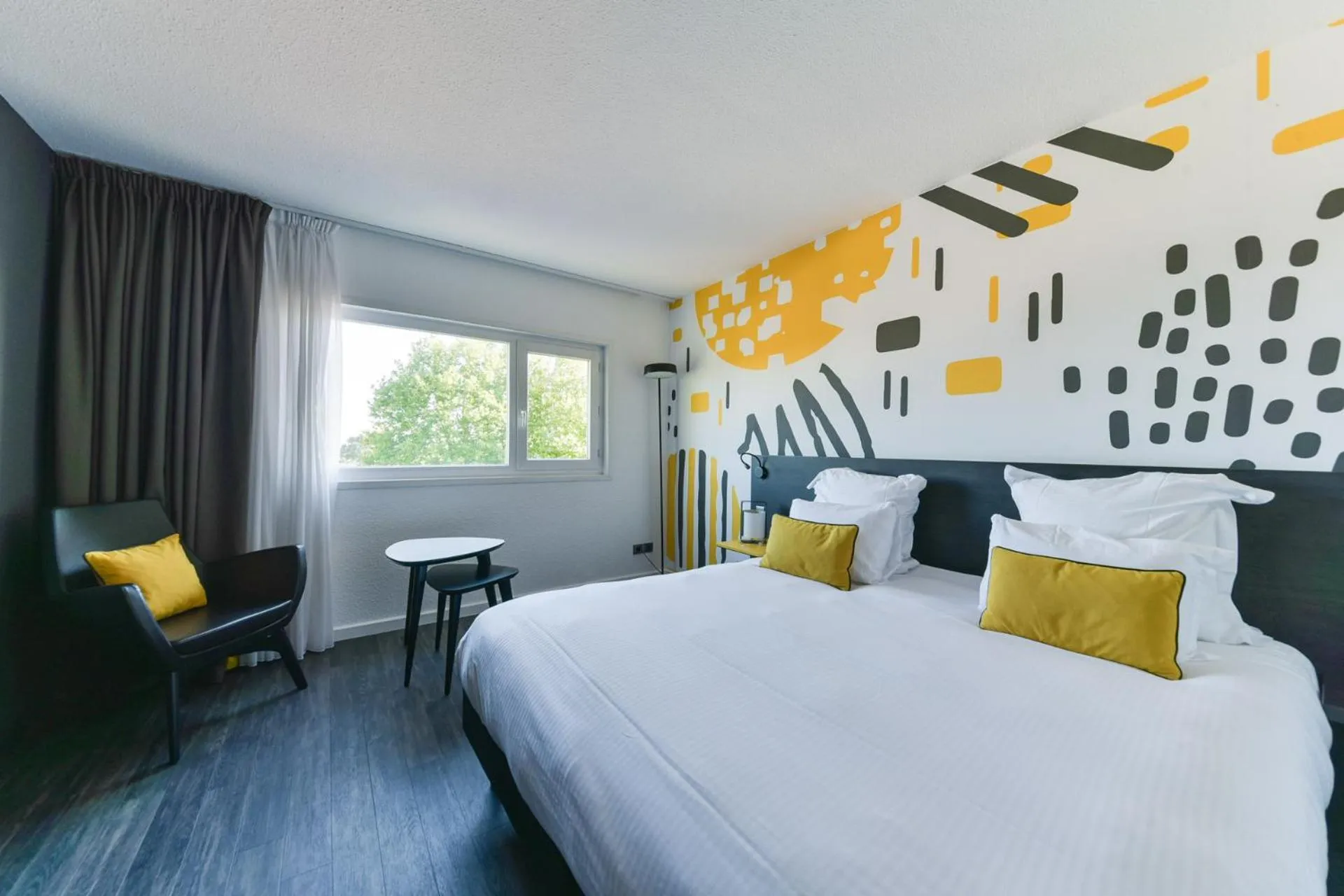 Bed in Golden Tulip Roissy Saint Witz