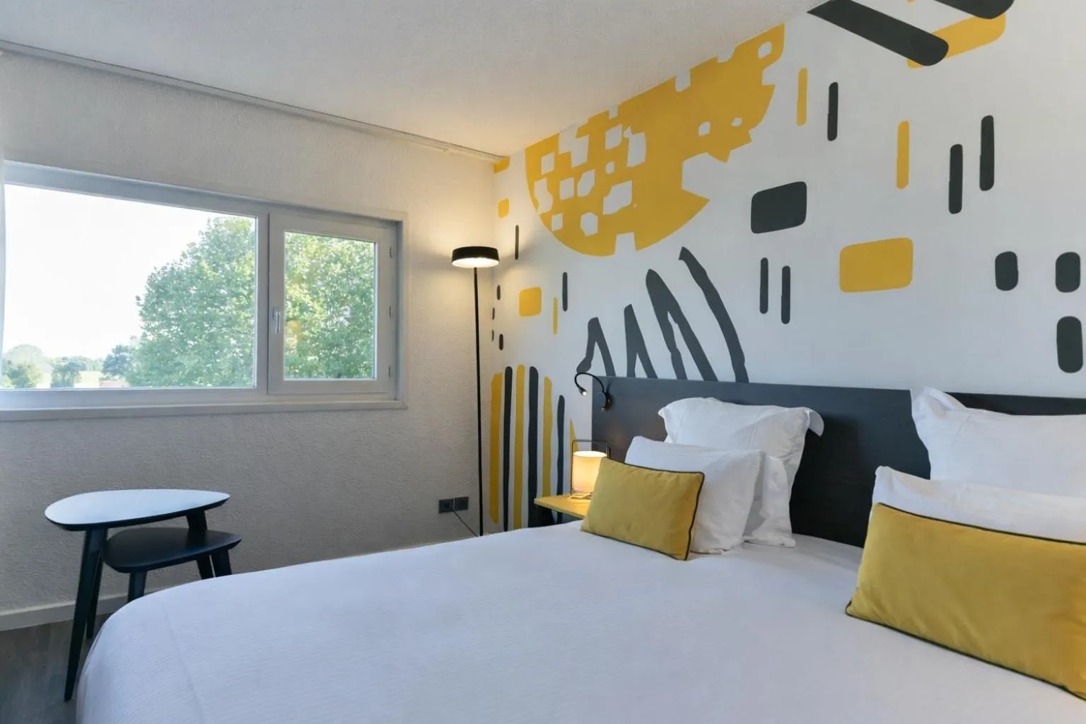 Bed in Golden Tulip Roissy Saint Witz