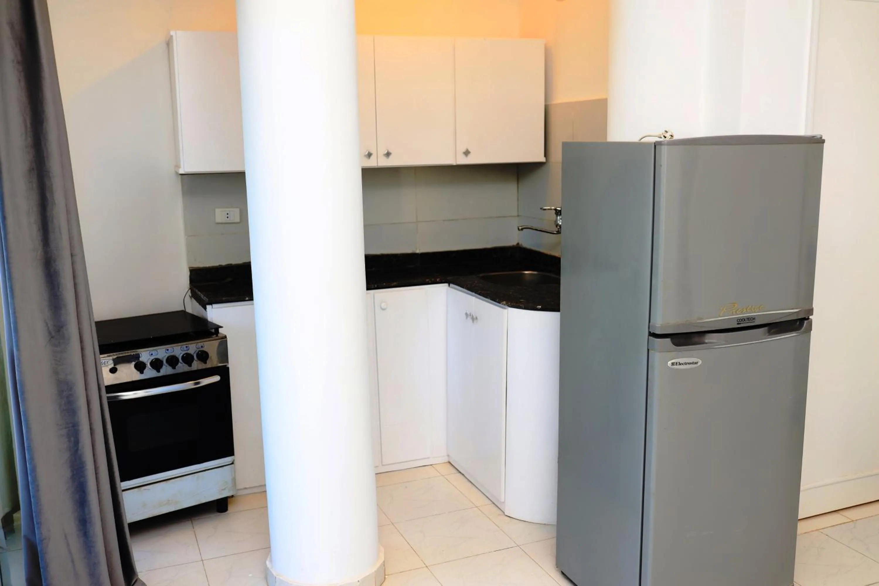 Kitchen or kitchenette in Spring Hotel Luxor