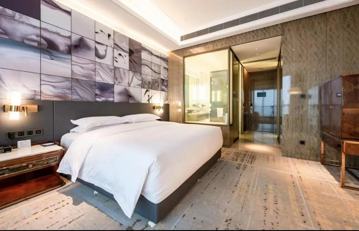 Bed in Wyndham Grand Suzhou Fenhu