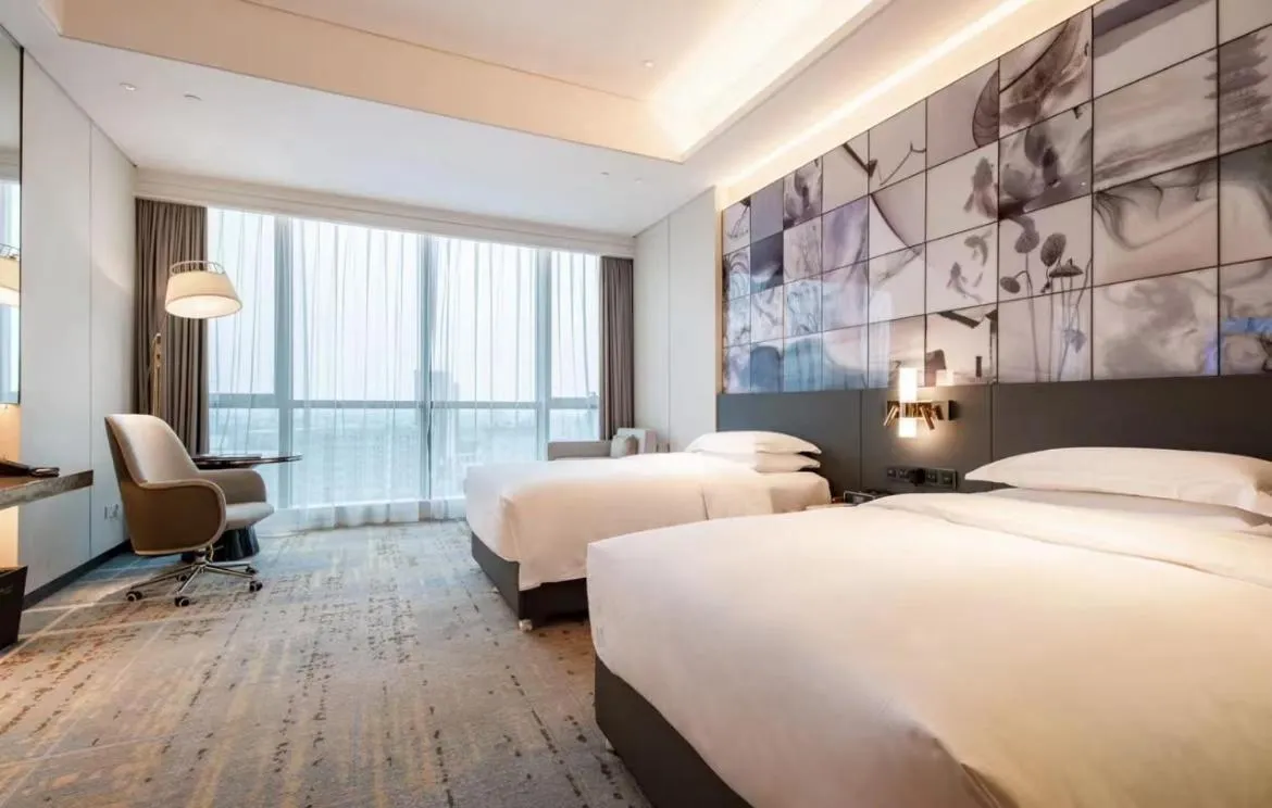 Bed in Wyndham Grand Suzhou Fenhu
