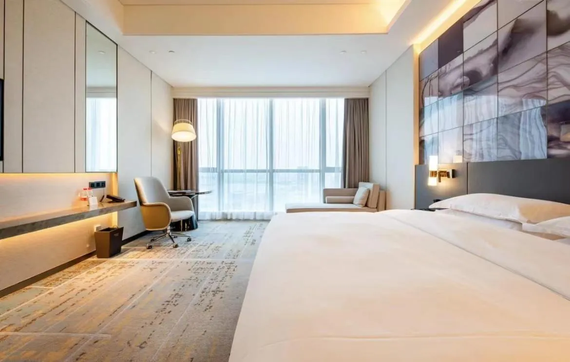 Bed in Wyndham Grand Suzhou Fenhu