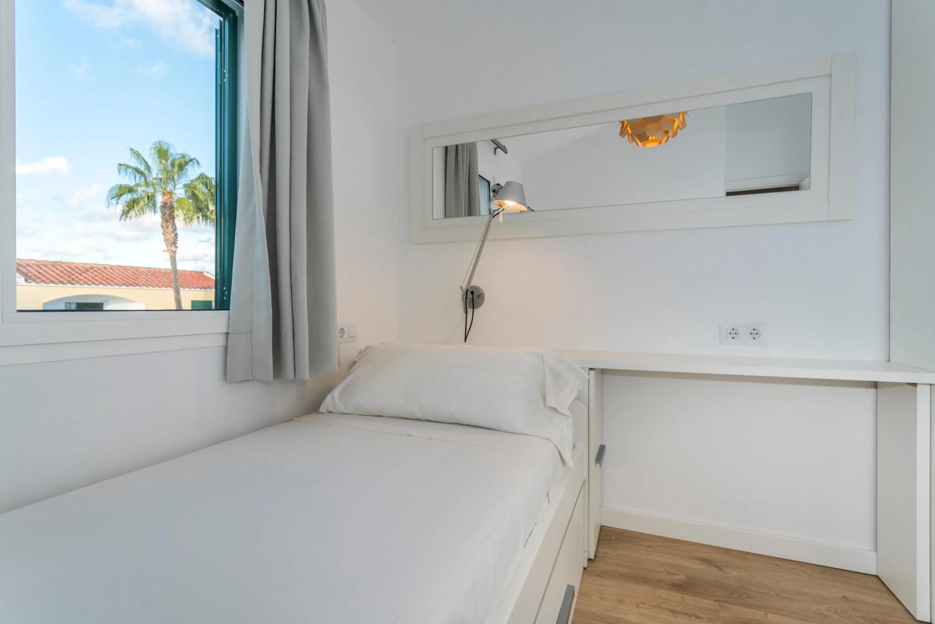 Bed in Apartaments Cales de Ponent