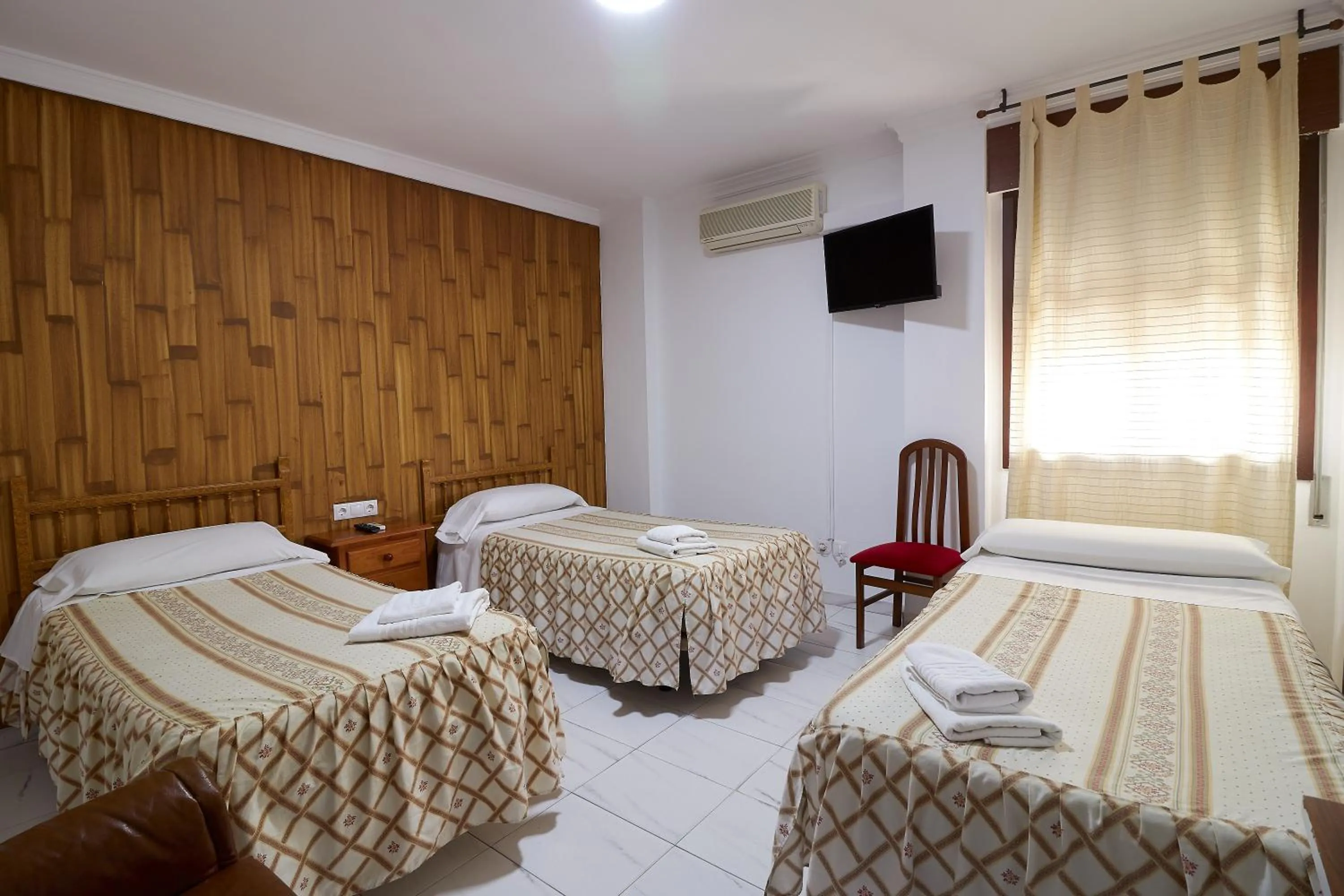 Bed in Hotel Virgen de los Reyes