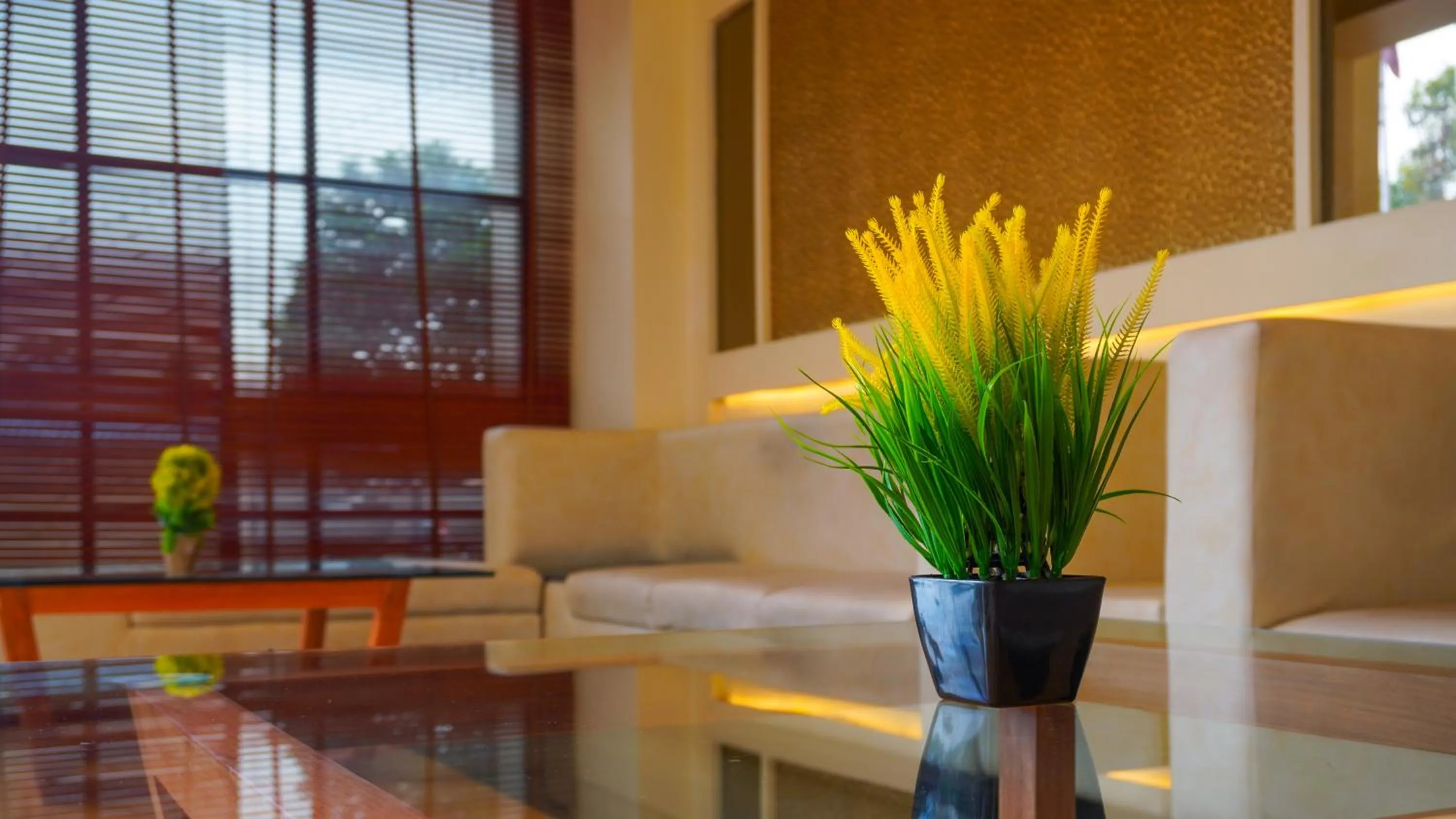 Seating area in Hotel Mansha Regency