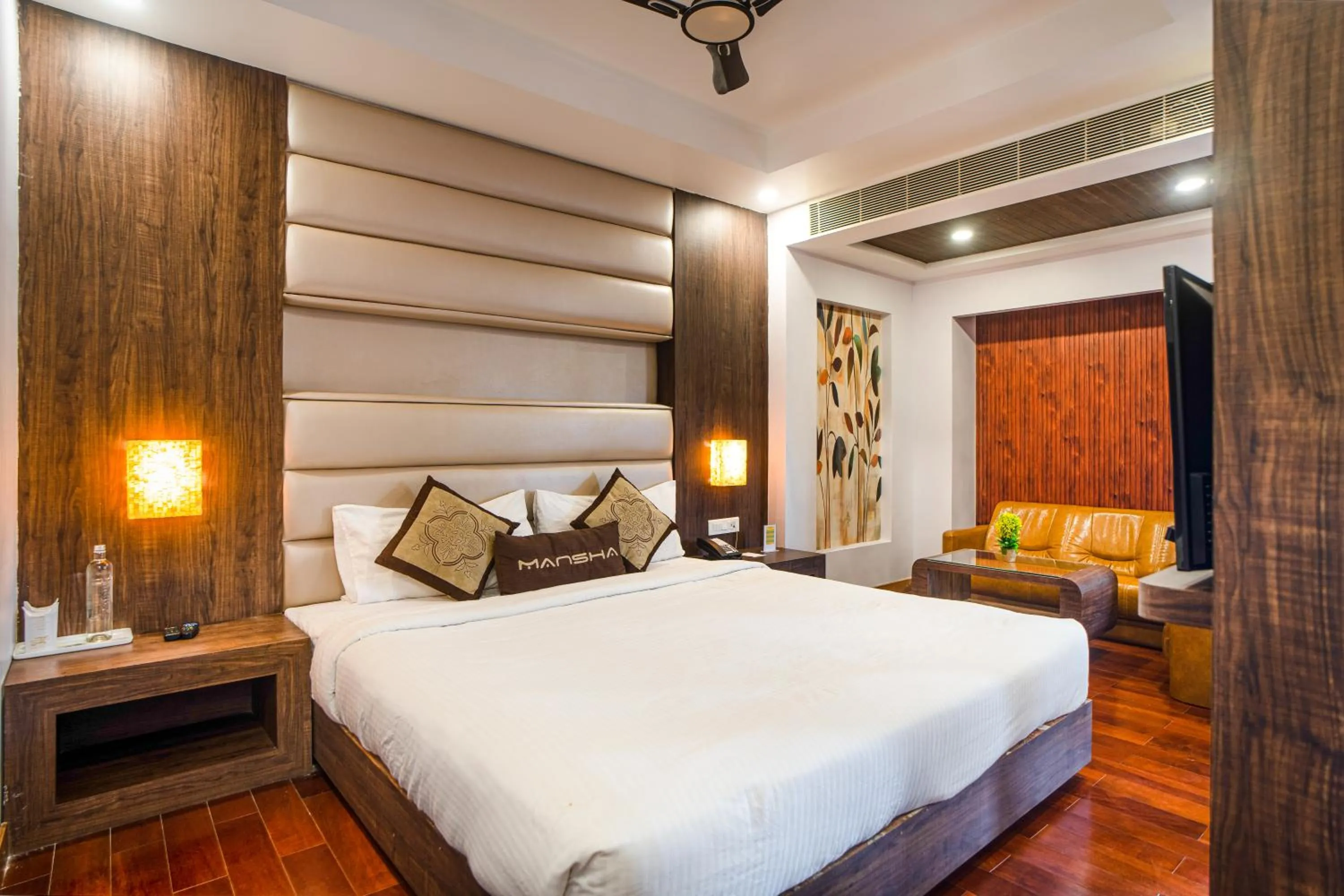 Bed in Hotel Mansha Regency