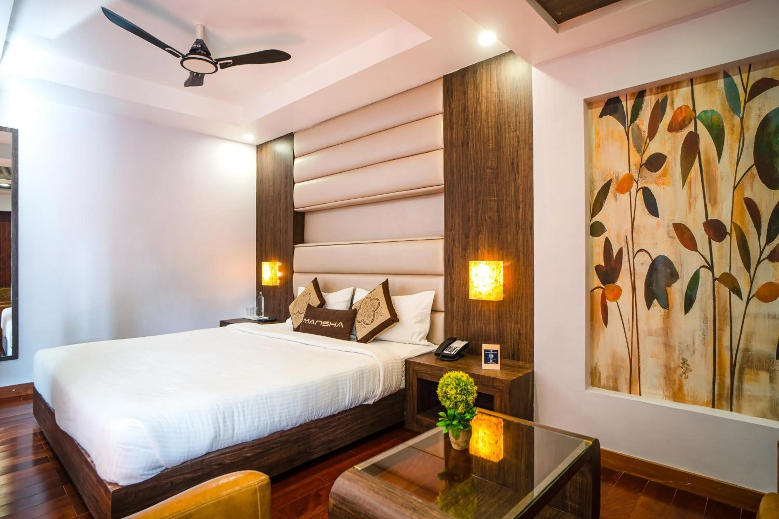 Bed in Hotel Mansha Regency