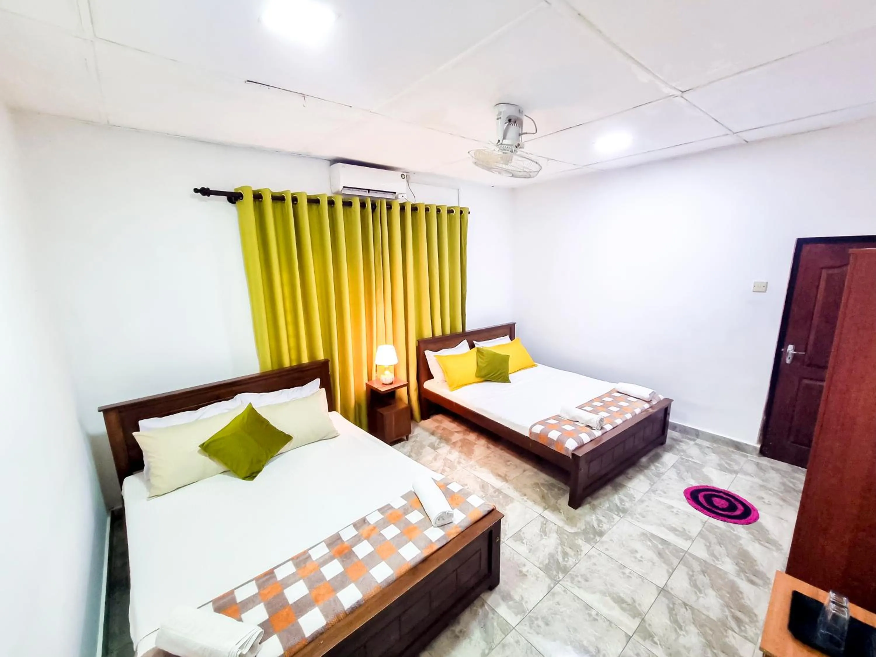 Photo of the whole room, Bed in HOSTEL KATUNAYAKE At COLOMBO AIRPORT TRANSIT