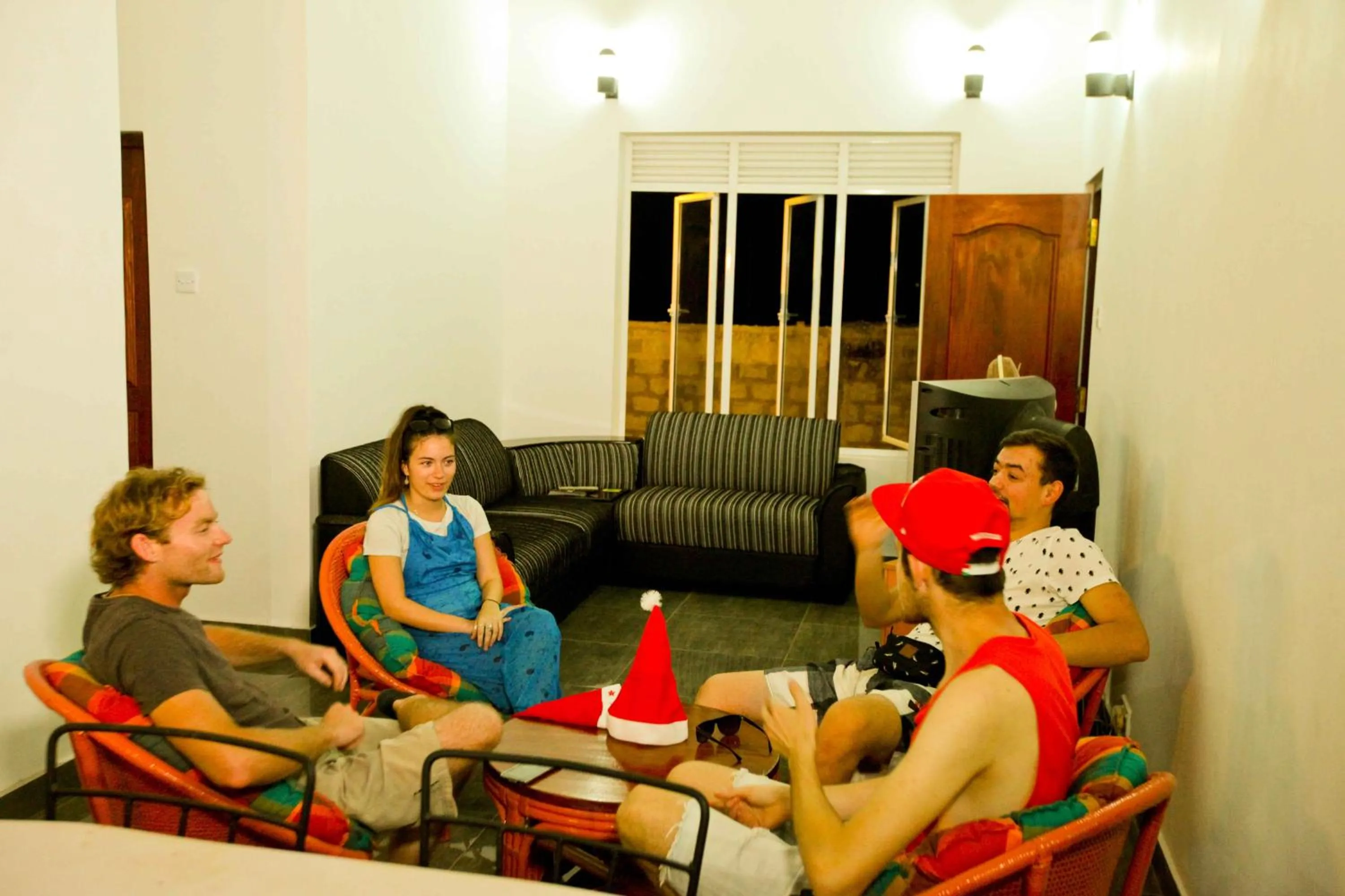 Communal lounge/ TV room in HOSTEL KATUNAYAKE At COLOMBO AIRPORT TRANSIT