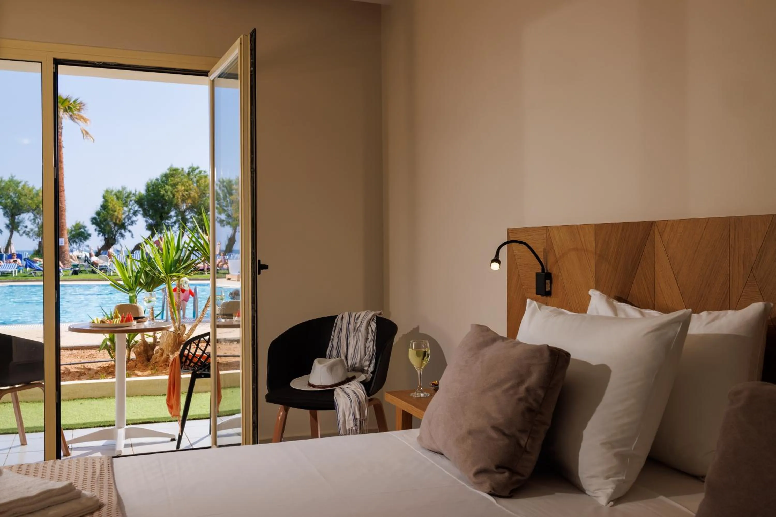 Bed in Malia Bay Beach Hotel & Bungalows