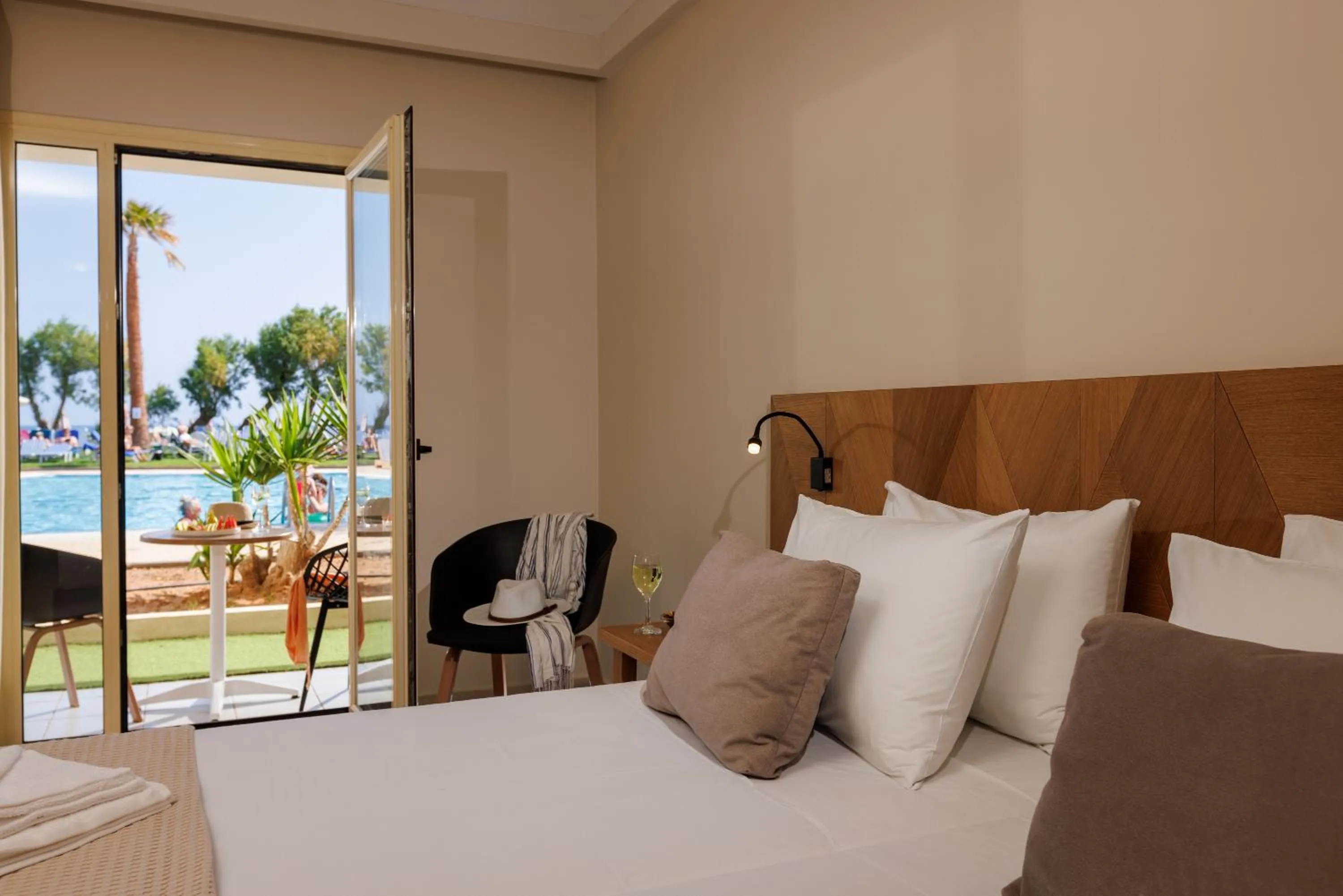 Bed in Malia Bay Beach Hotel & Bungalows