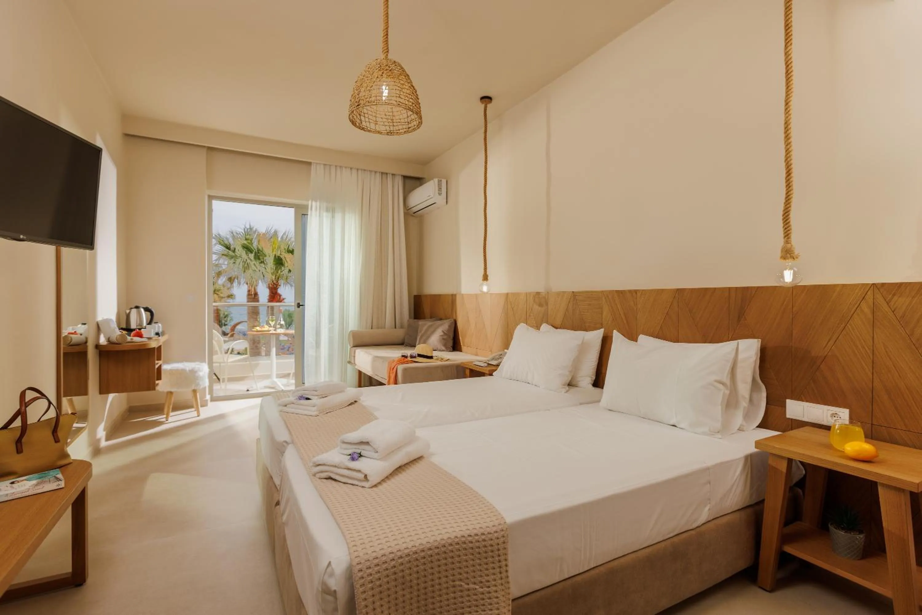 Bed in Malia Bay Beach Hotel & Bungalows